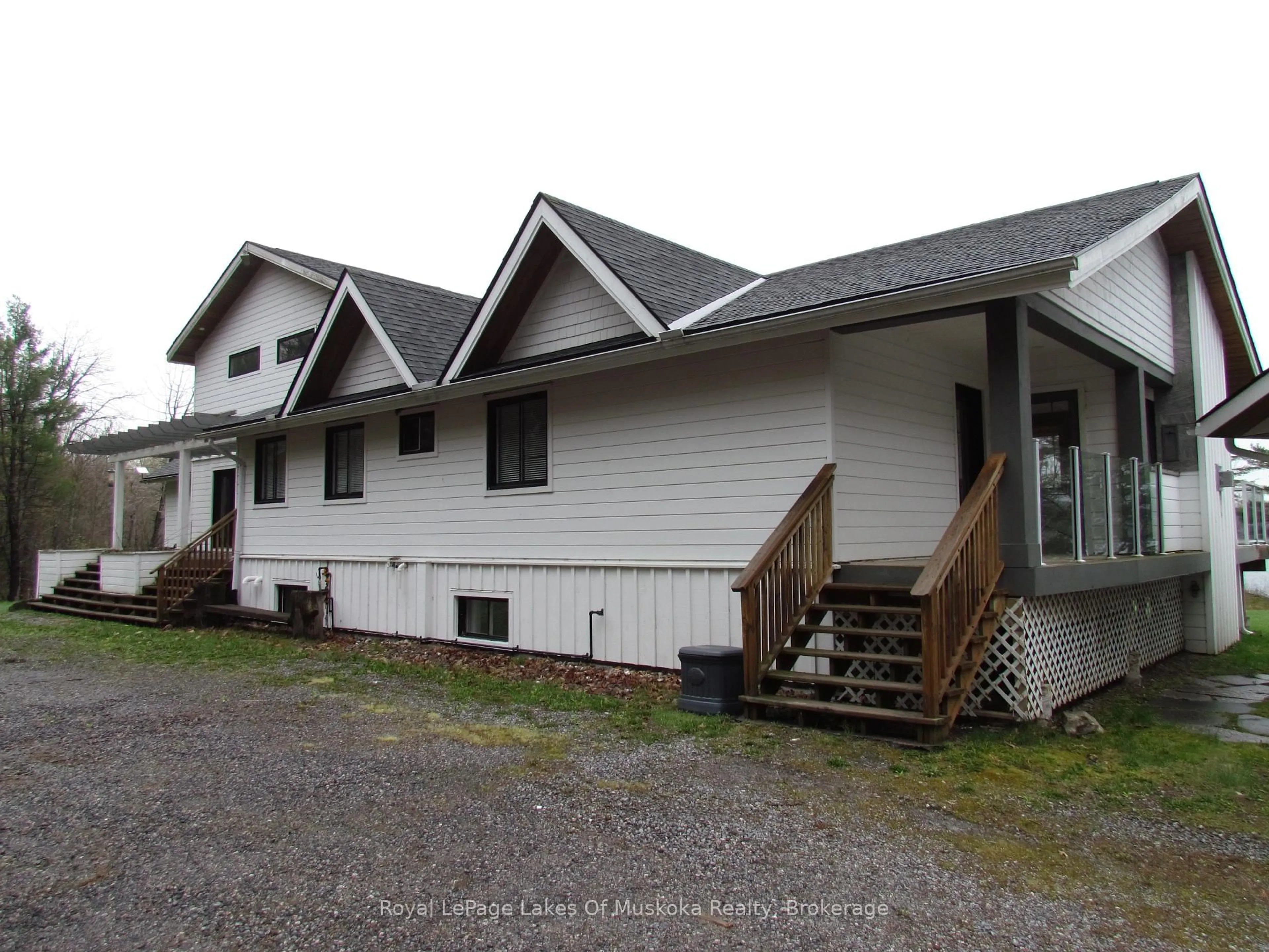 Home with vinyl exterior material, building for 1-1331 South Monck Dr, Muskoka Lakes Ontario P1L 1W8