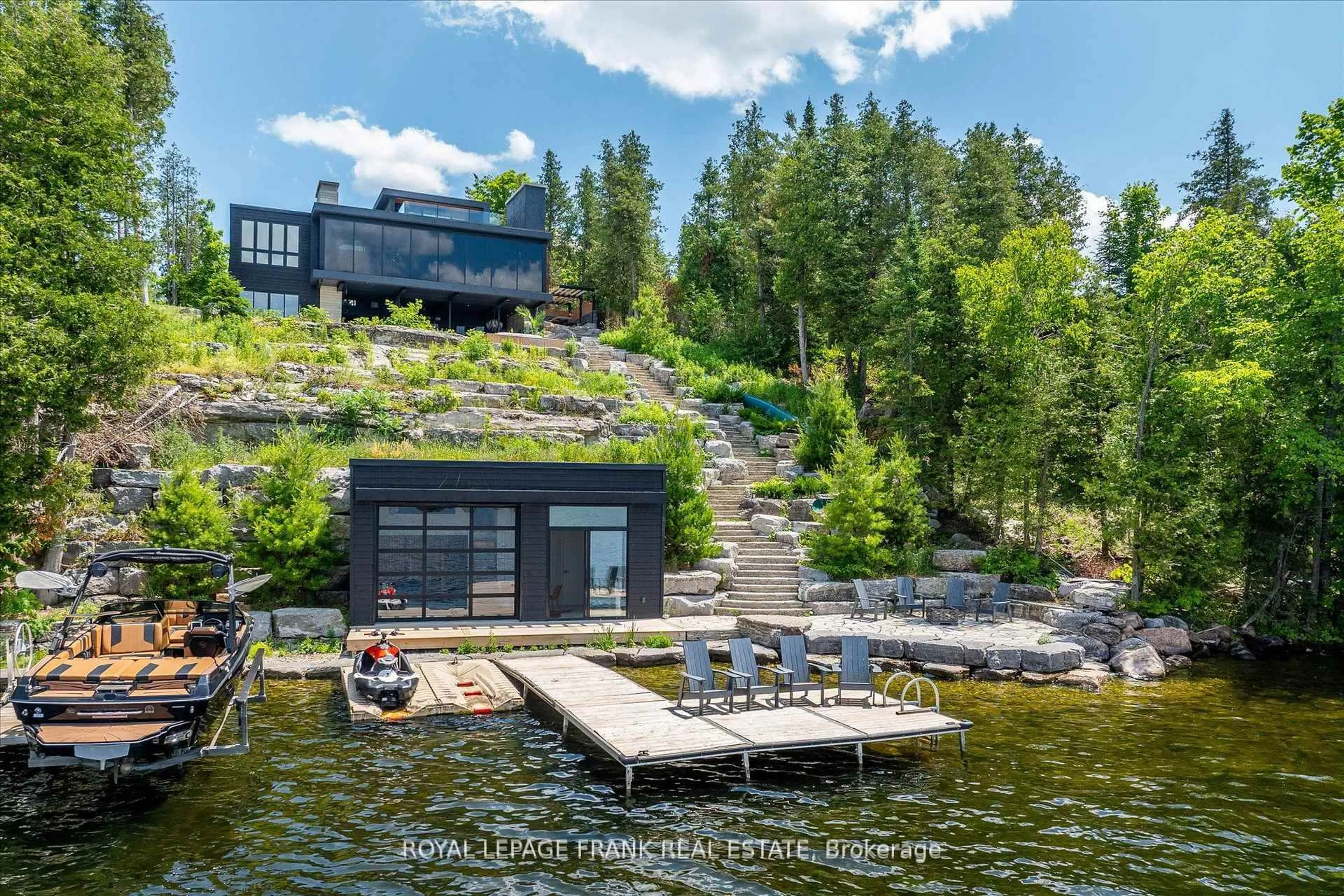 A pic from outside/outdoor area/front of a property/back of a property/a pic from drone, water/lake/river/ocean view for 910 Birchview Rd, Douro-Dummer Ontario K0L 2H0