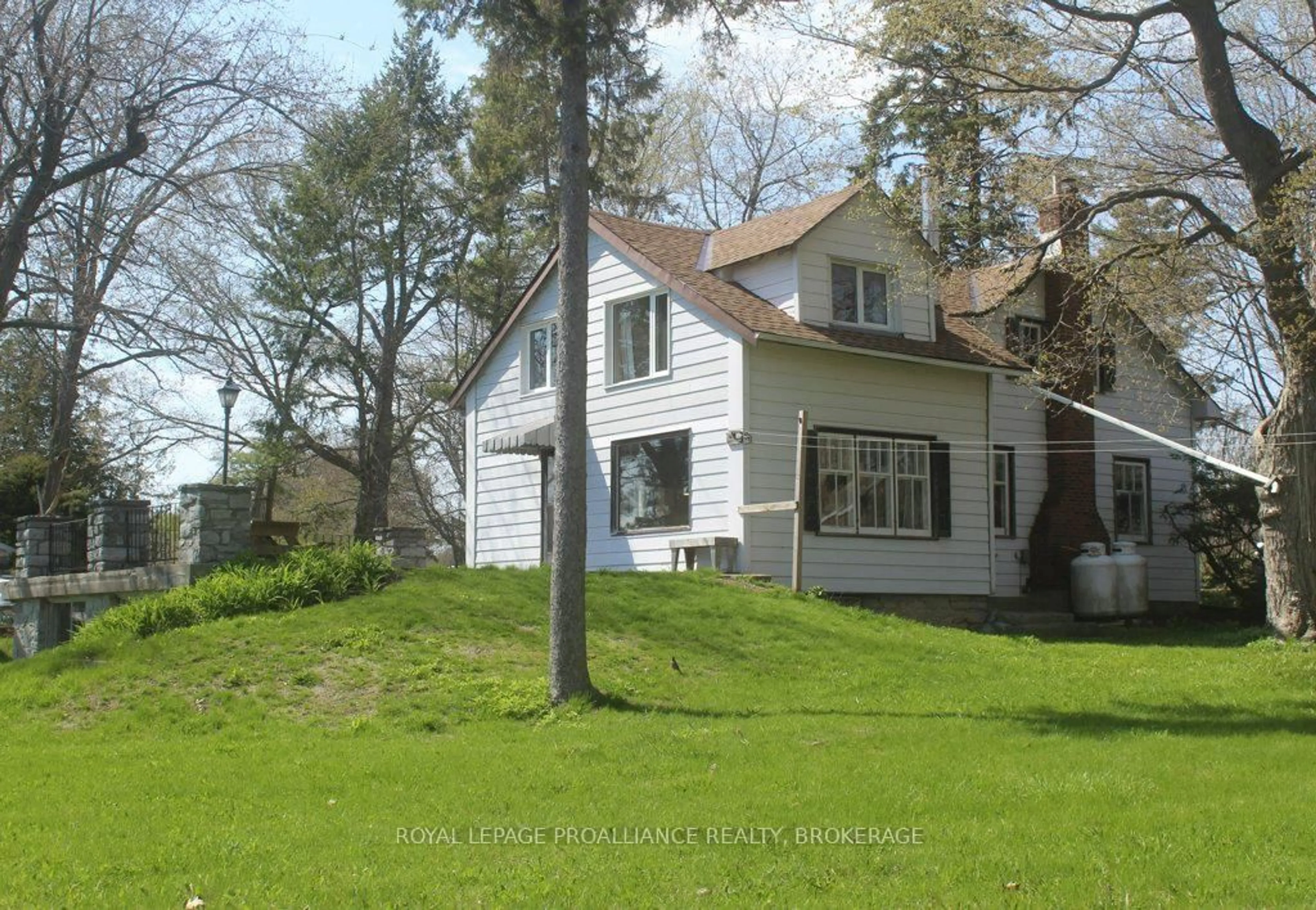 A pic from outside/outdoor area/front of a property/back of a property/a pic from drone, street for 4690 Bath Rd, Bath Ontario K0H 1G0