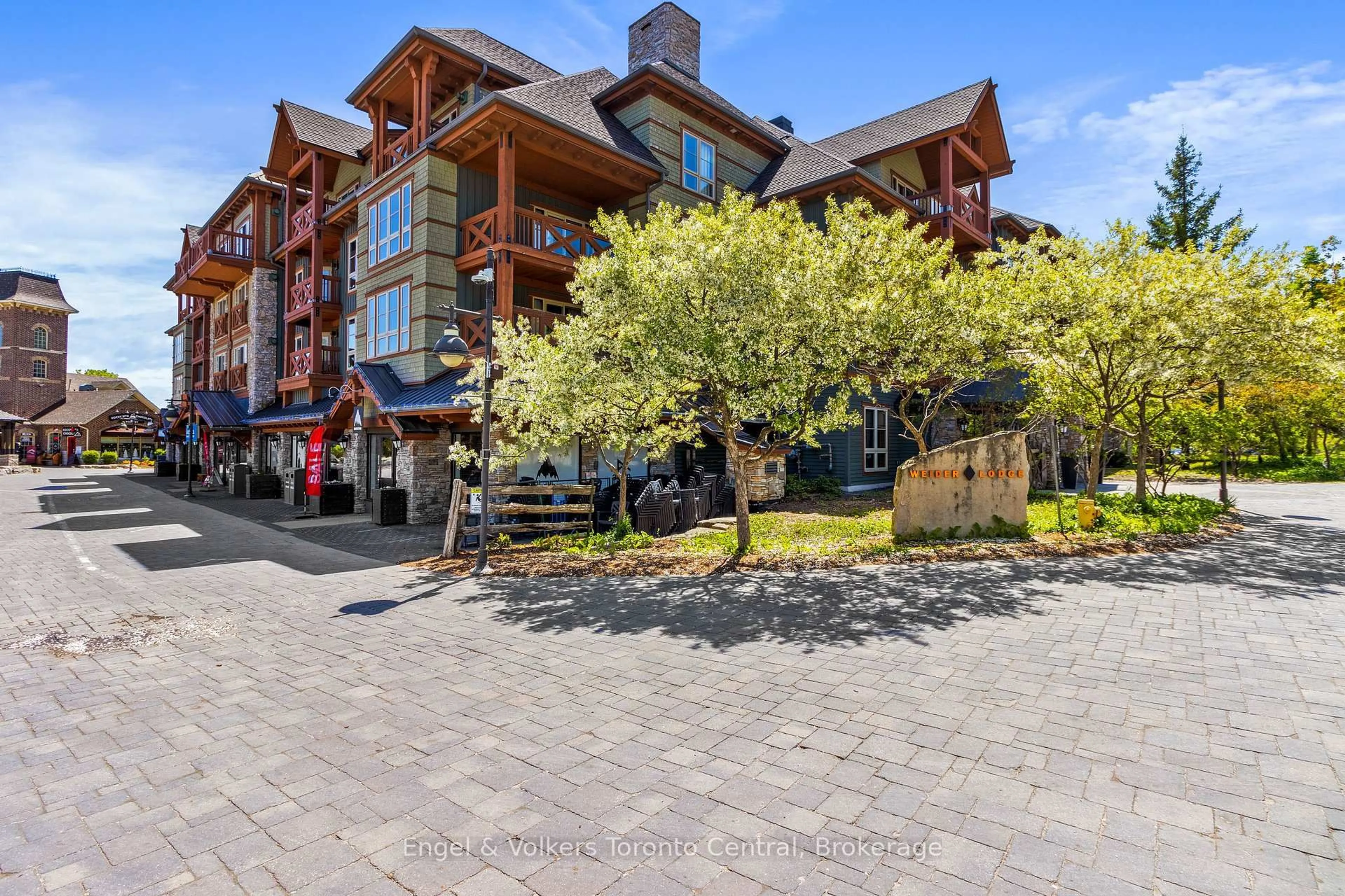 A pic from outside/outdoor area/front of a property/back of a property/a pic from drone, street for 152 Jozo Weider Blvd #319 321, Blue Mountains Ontario L9Y 0V2