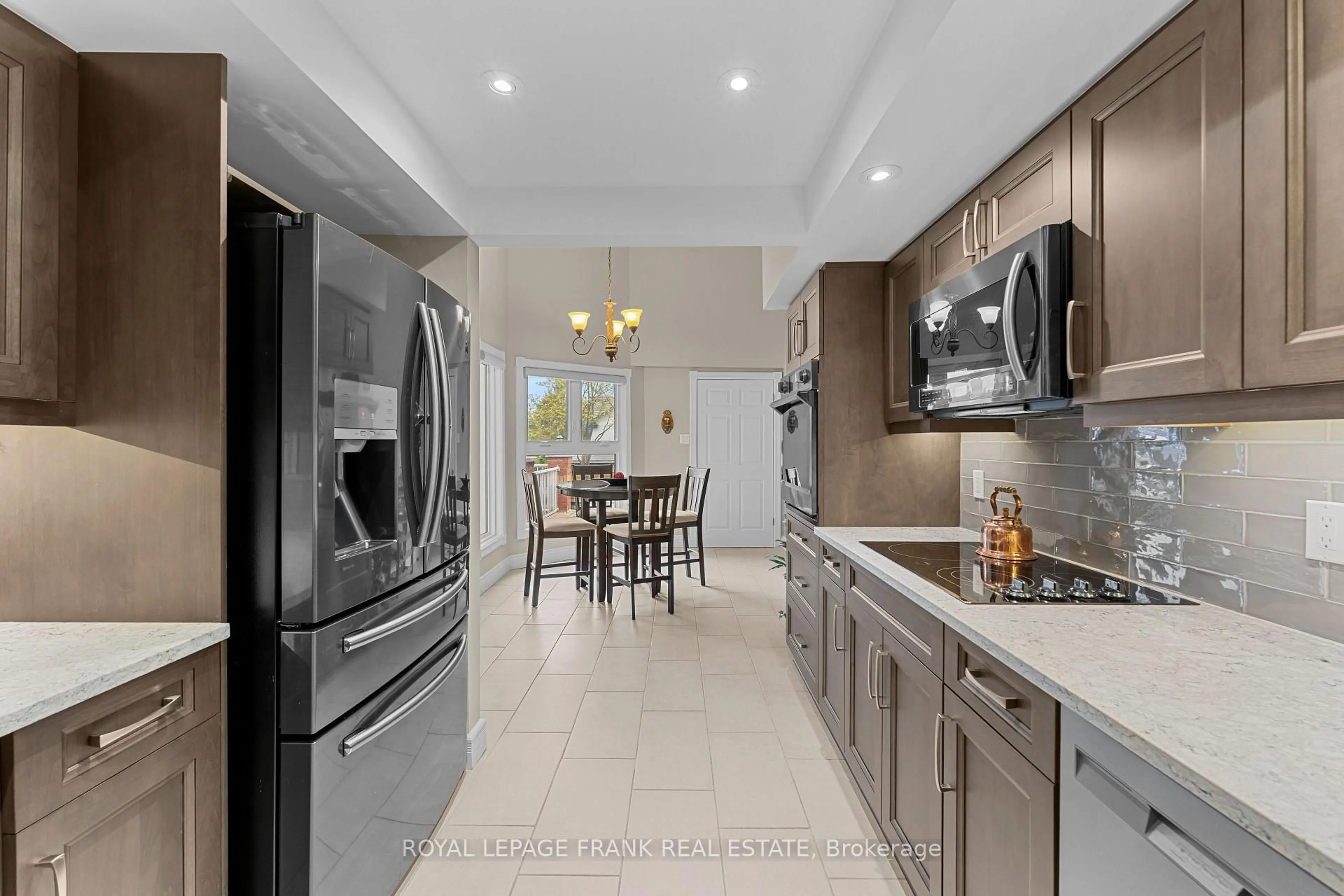 Open concept kitchen, ceramic/tile floor for 1 Sherwood St #403, Kawartha Lakes Ontario K0M 1A0