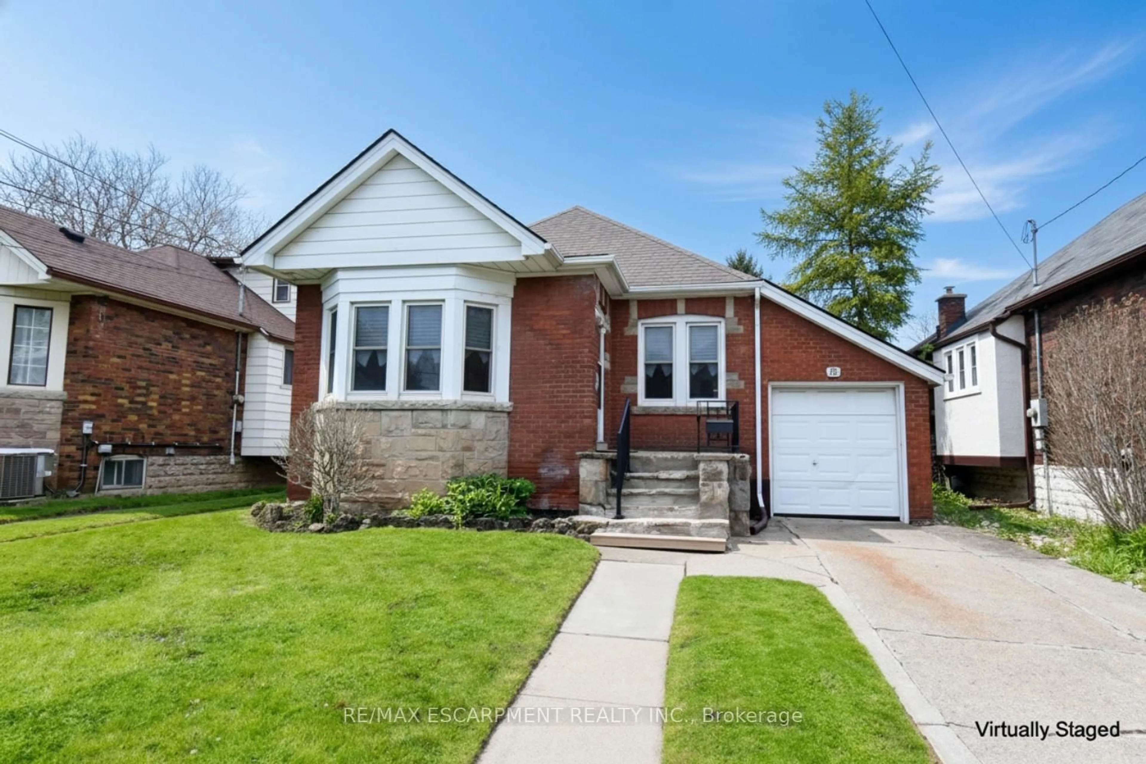Home with brick exterior material, street for 8 Norwood Rd, Hamilton Ontario L8S 3P9