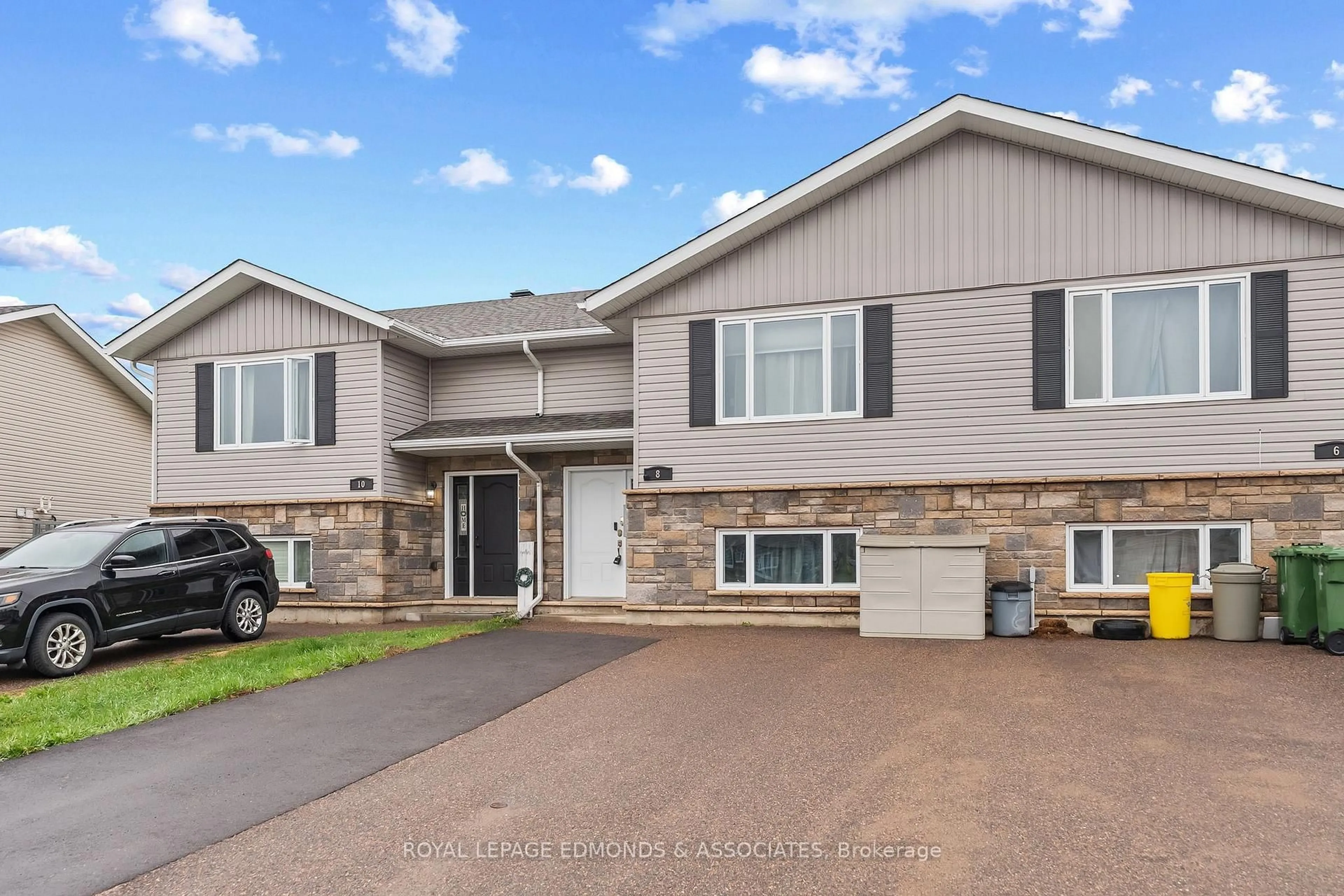 Home with vinyl exterior material, street for 8 William Thomas Dr, Petawawa Ontario K8H 0C3