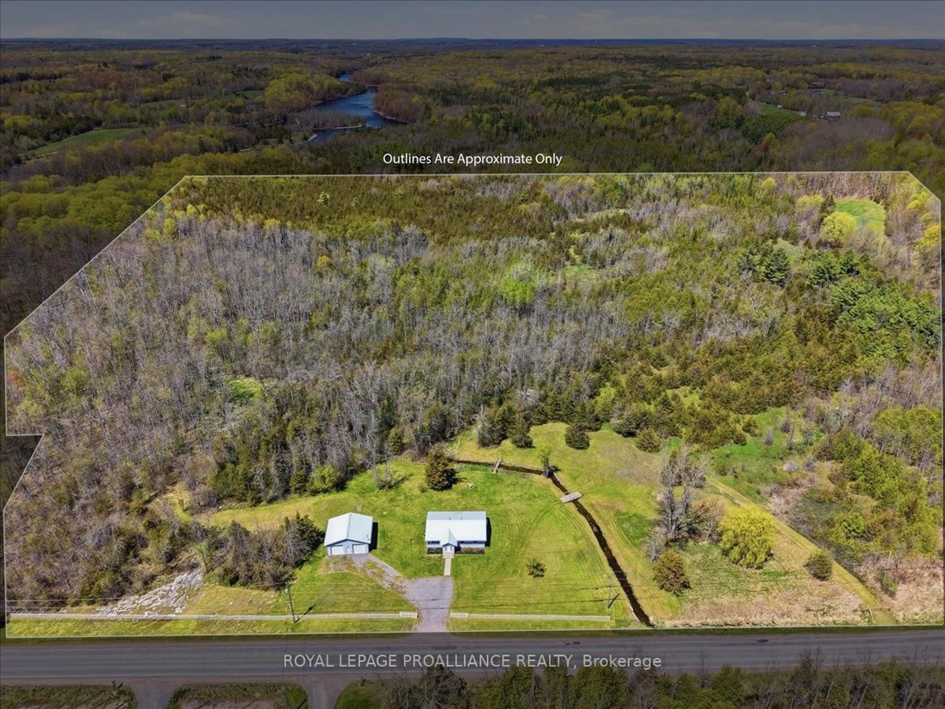 A pic from outside/outdoor area/front of a property/back of a property/a pic from drone, water/lake/river/ocean view for 111 Moneymore Rd, Belleville Ontario K0K 2Y0