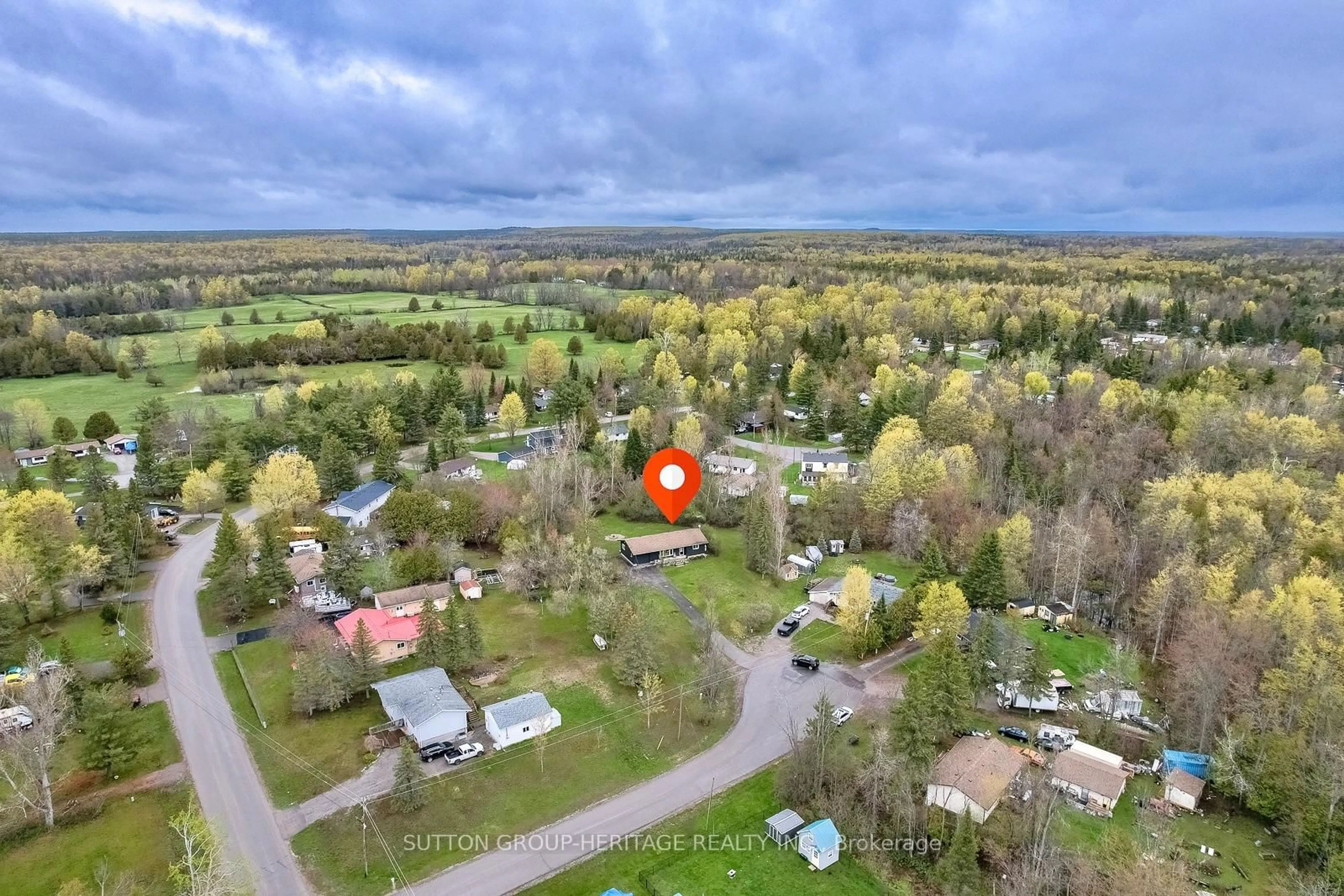 A pic from outside/outdoor area/front of a property/back of a property/a pic from drone, forest/trees view for 11 Swiss Cres, Trent Lakes Ontario K0M 1A0