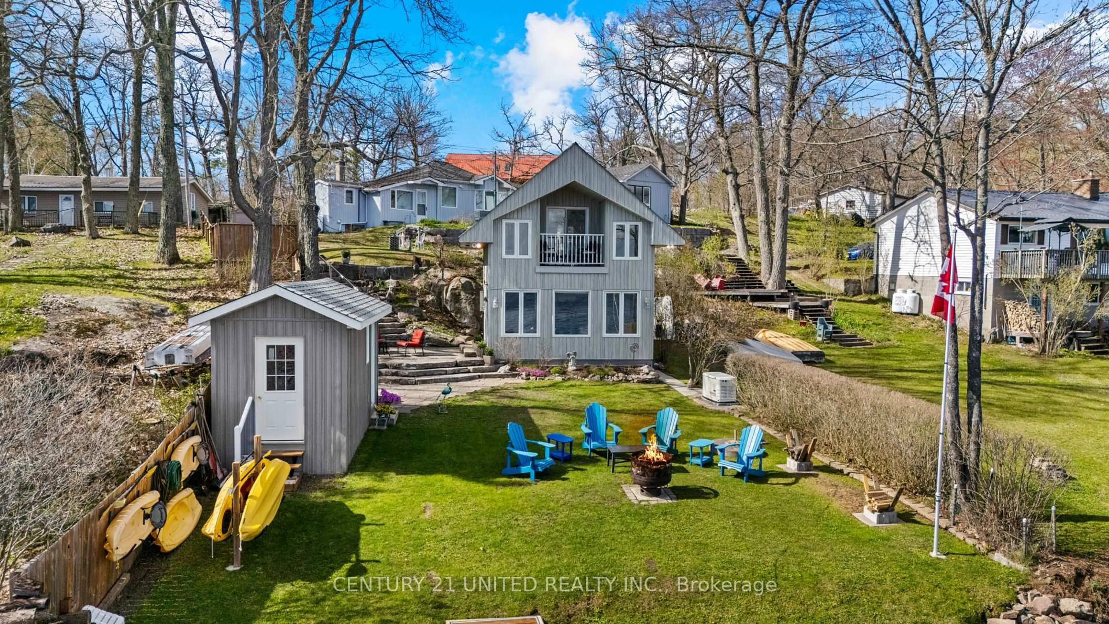 A pic from outside/outdoor area/front of a property/back of a property/a pic from drone, water/lake/river/ocean view for 31 Fire Route 28, North Kawartha Ontario K0L 2H0