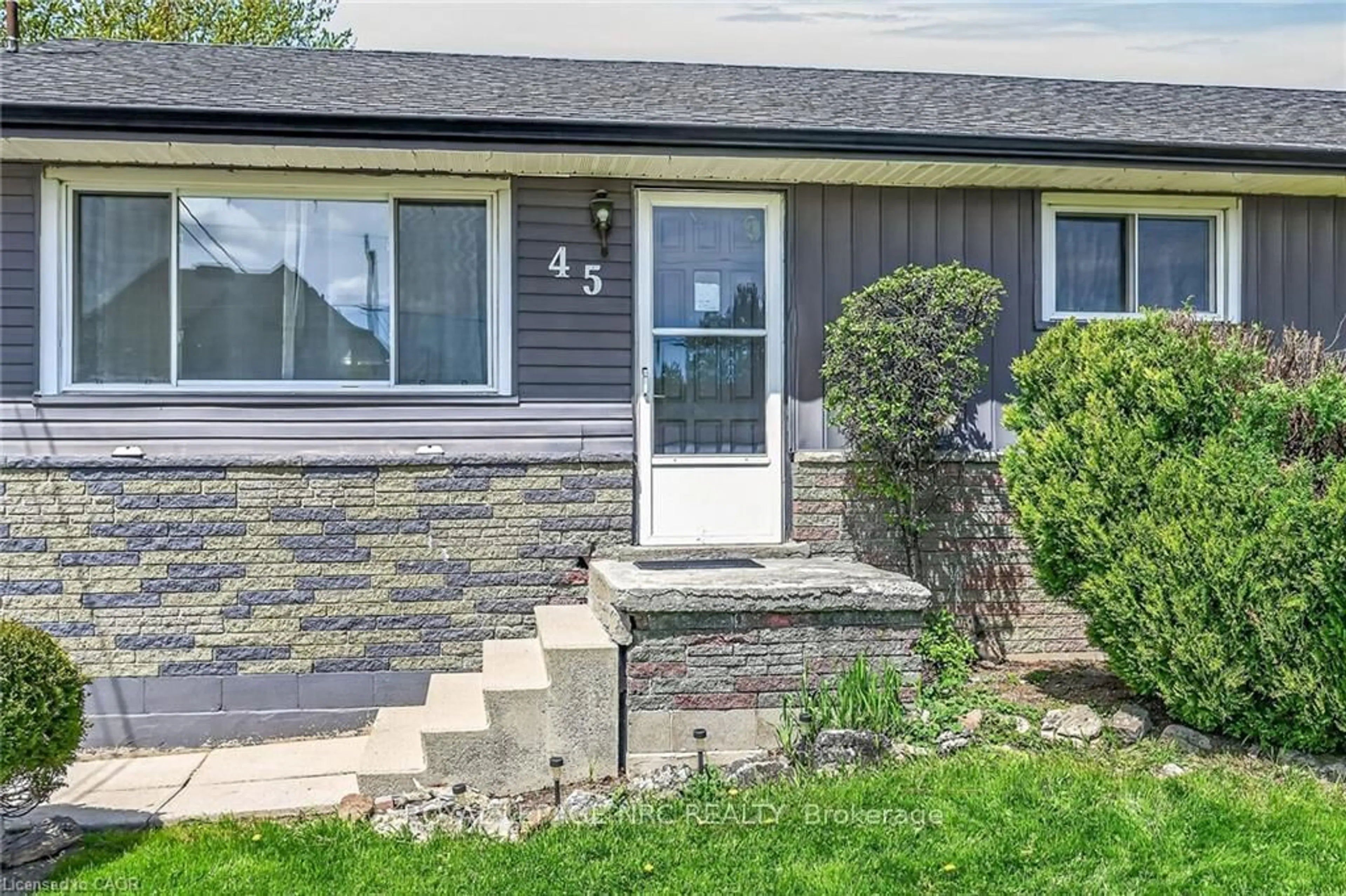 Home with vinyl exterior material, street for 45 Leckie Ave, Hamilton Ontario L8J 2S7