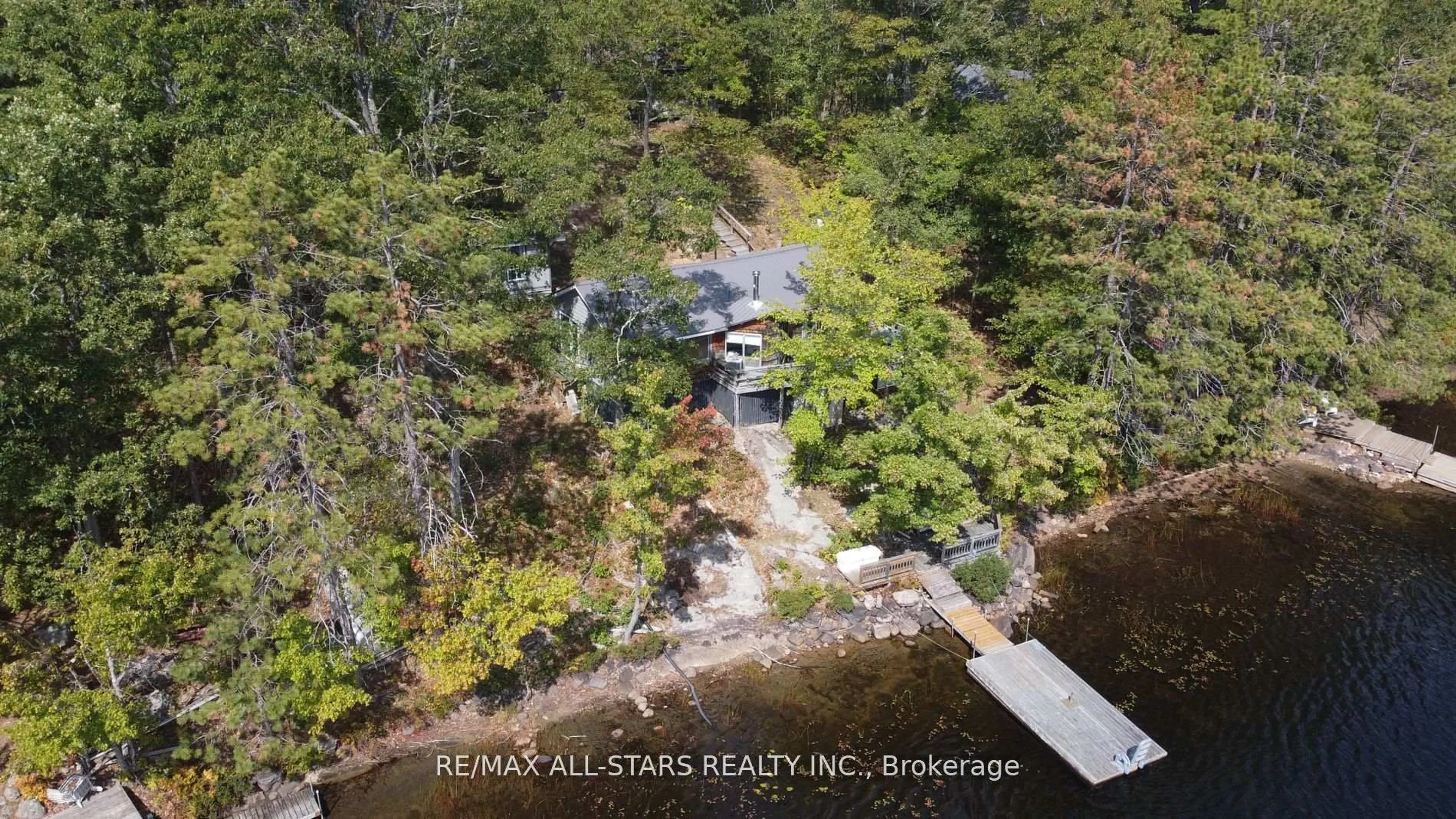 A pic from outside/outdoor area/front of a property/back of a property/a pic from drone, water/lake/river/ocean view for 754 Loucks Lake Wao, North Kawartha Ontario K0L 1A0