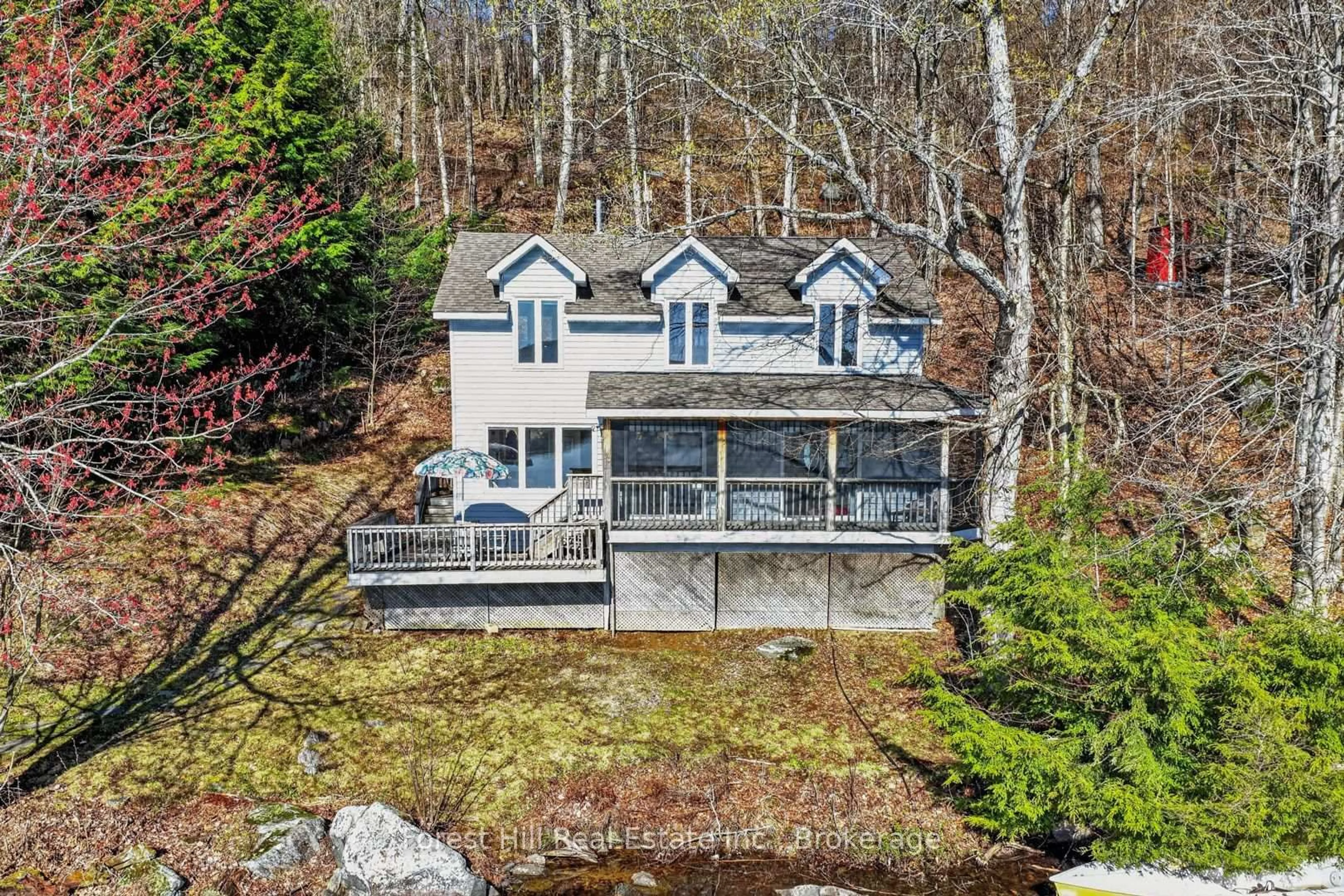 A pic from outside/outdoor area/front of a property/back of a property/a pic from drone, water/lake/river/ocean view for 10835 Raven Lake West Shore Township, Algonquin Highlands Ontario P0A 1E0