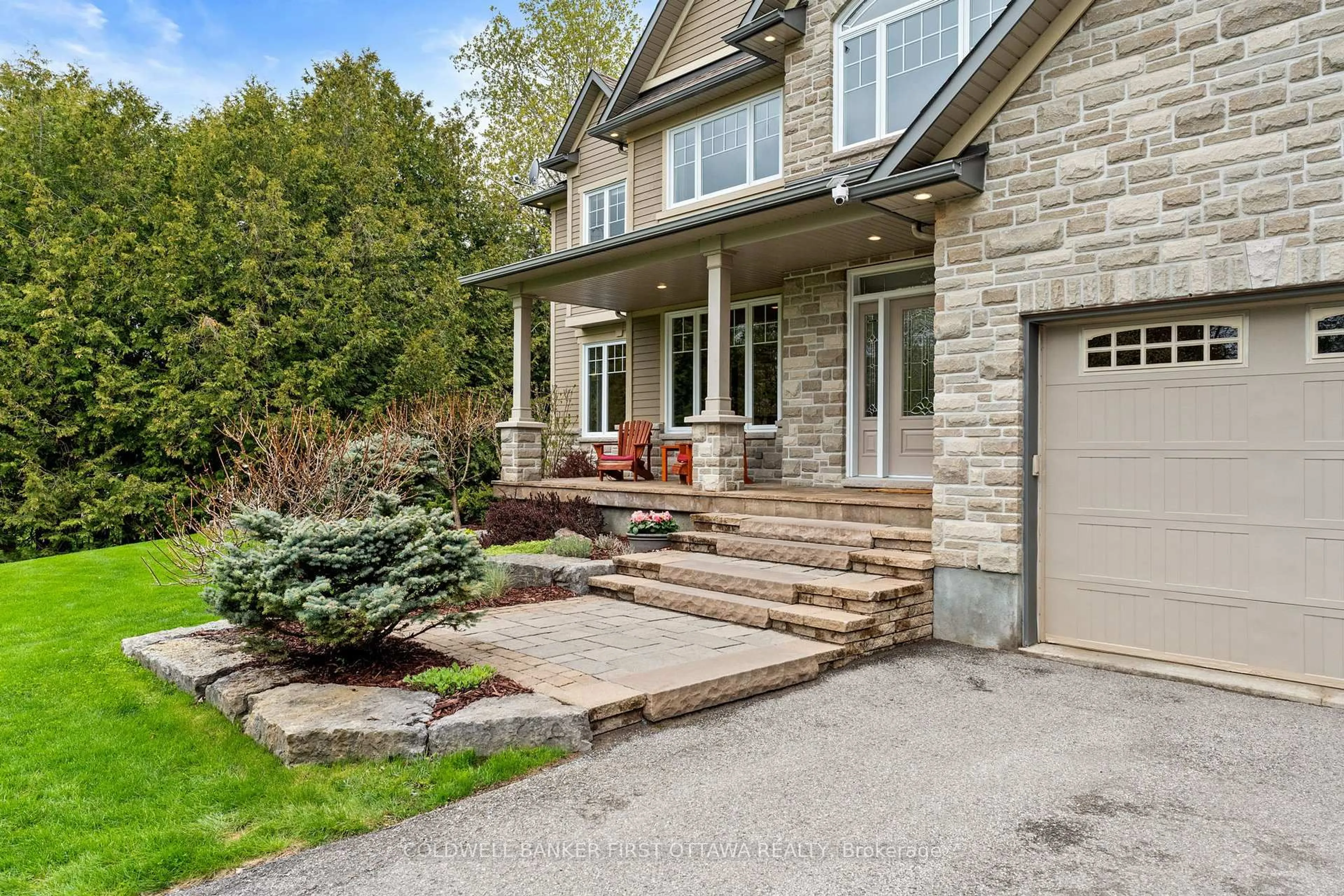 Home with brick exterior material, street for 231 Ironstone Crt, Stittsville Ontario K2S 0L4