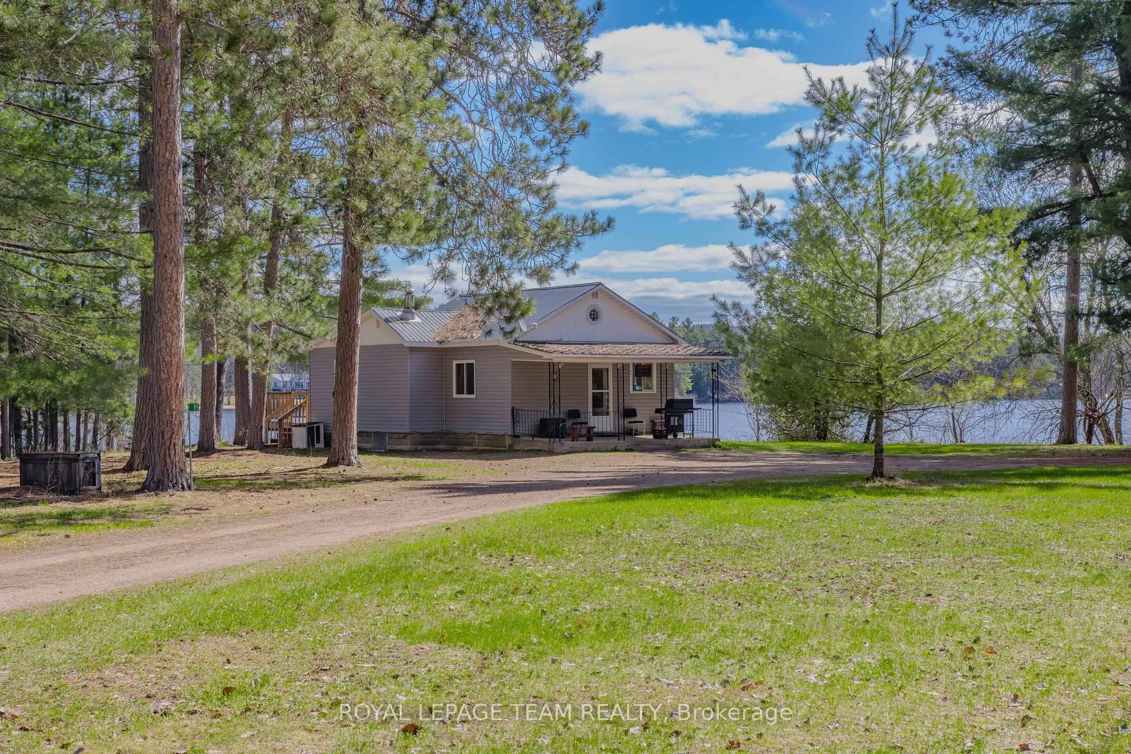 A pic from outside/outdoor area/front of a property/back of a property/a pic from drone, water/lake/river/ocean view for 95 Lorbetskie Rd, Barry's Bay Ontario K0J 1B0