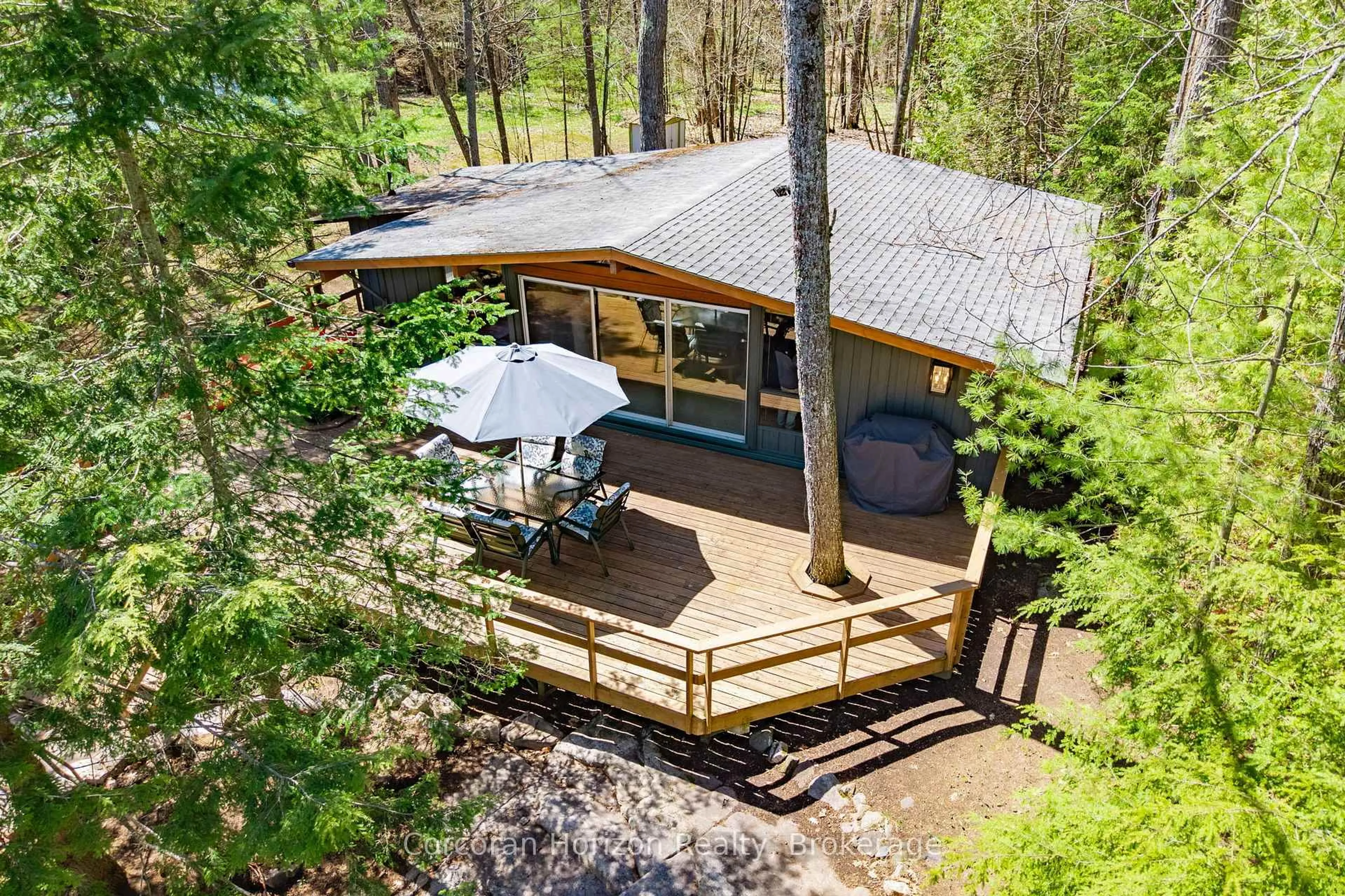 A pic from outside/outdoor area/front of a property/back of a property/a pic from drone, forest/trees view for 462 Island 90 Island, Georgian Bay Ontario L0K 1S0