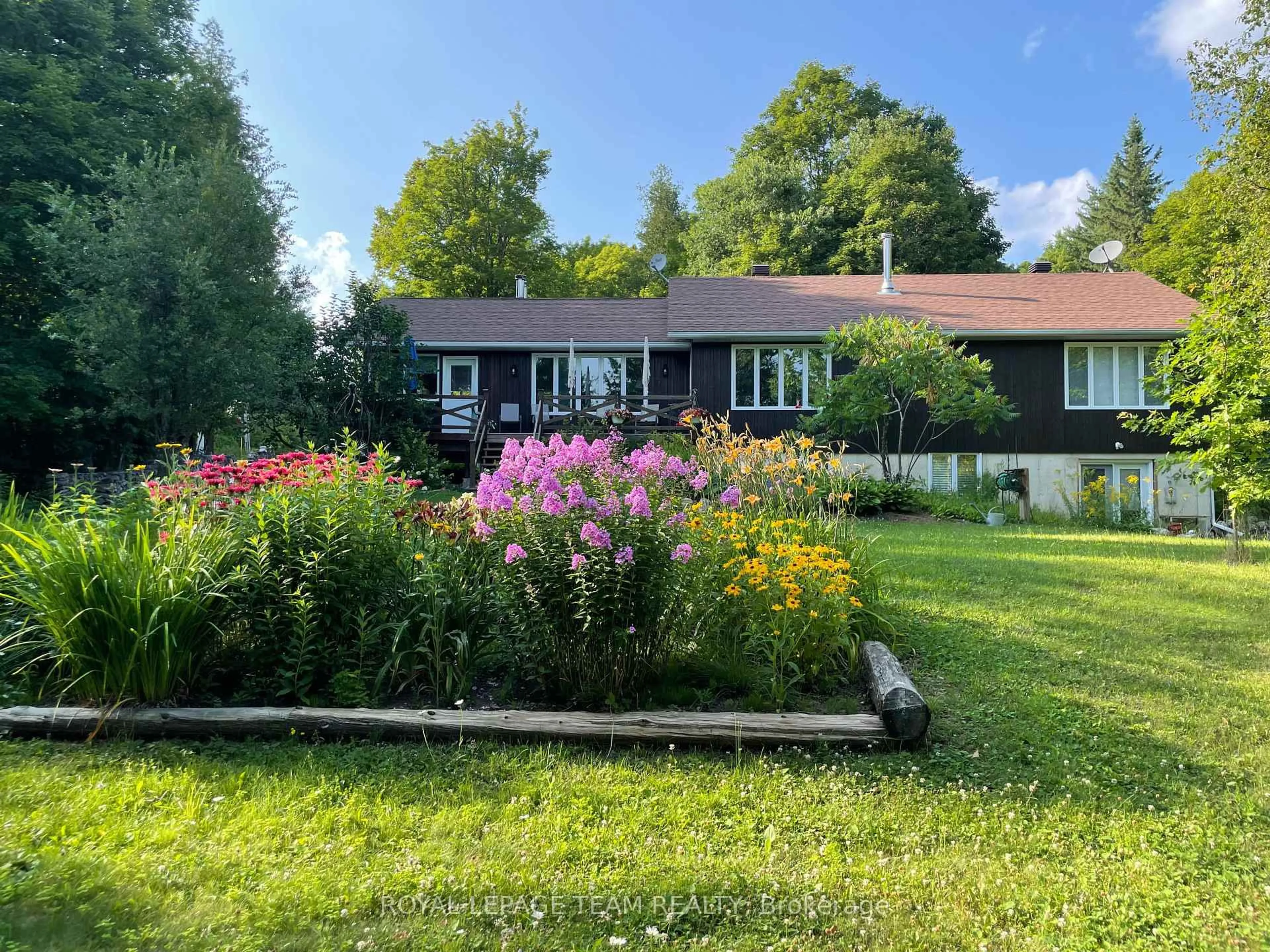 A pic from outside/outdoor area/front of a property/back of a property/a pic from drone, unknown for 58 Luloff Lane, Palmer Rapids Ontario K0J 2E0