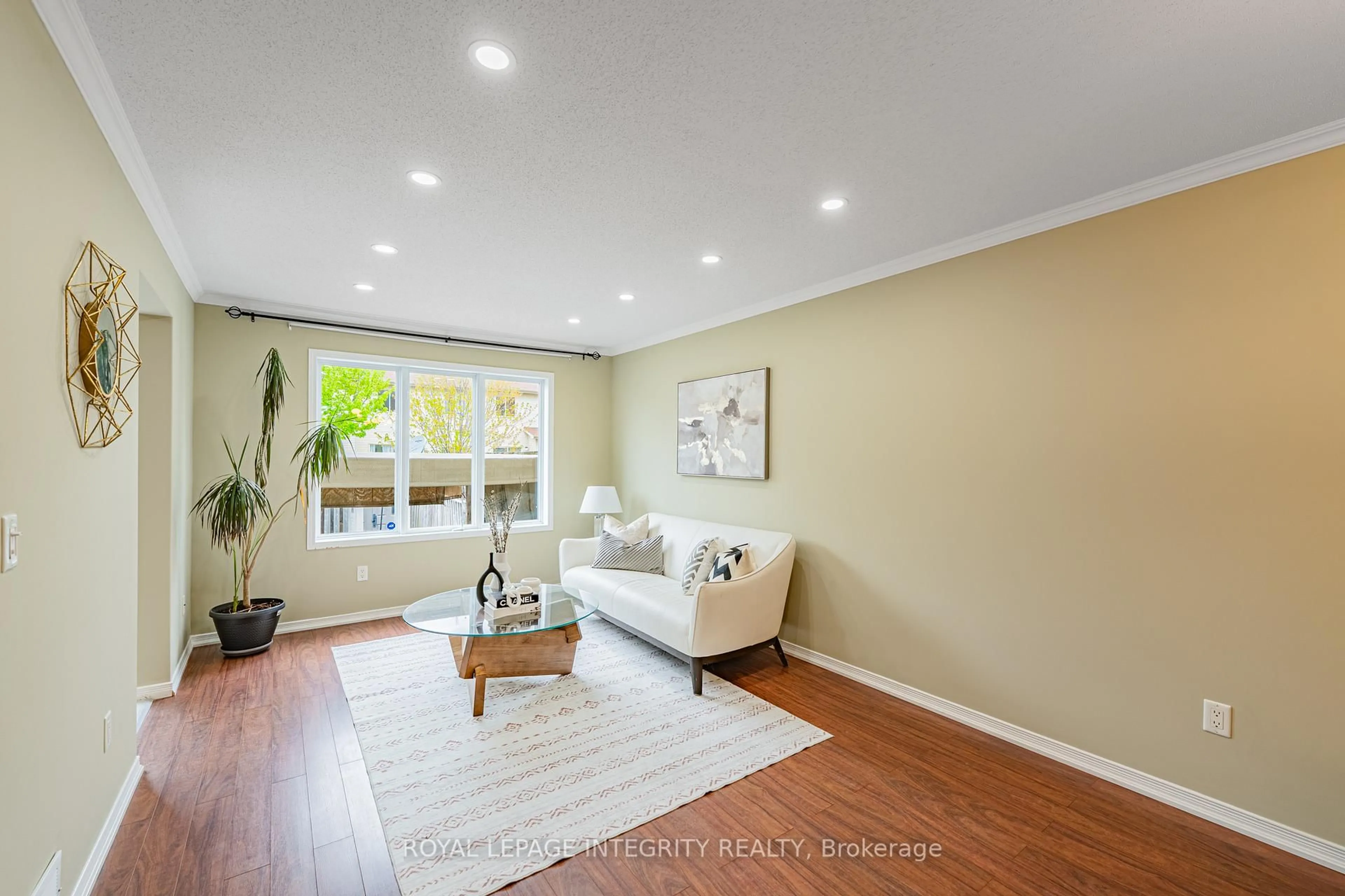 Living room with furniture, wood/laminate floor for 319 GLENBRAE Ave, Ottawa Ontario K2W 0B9