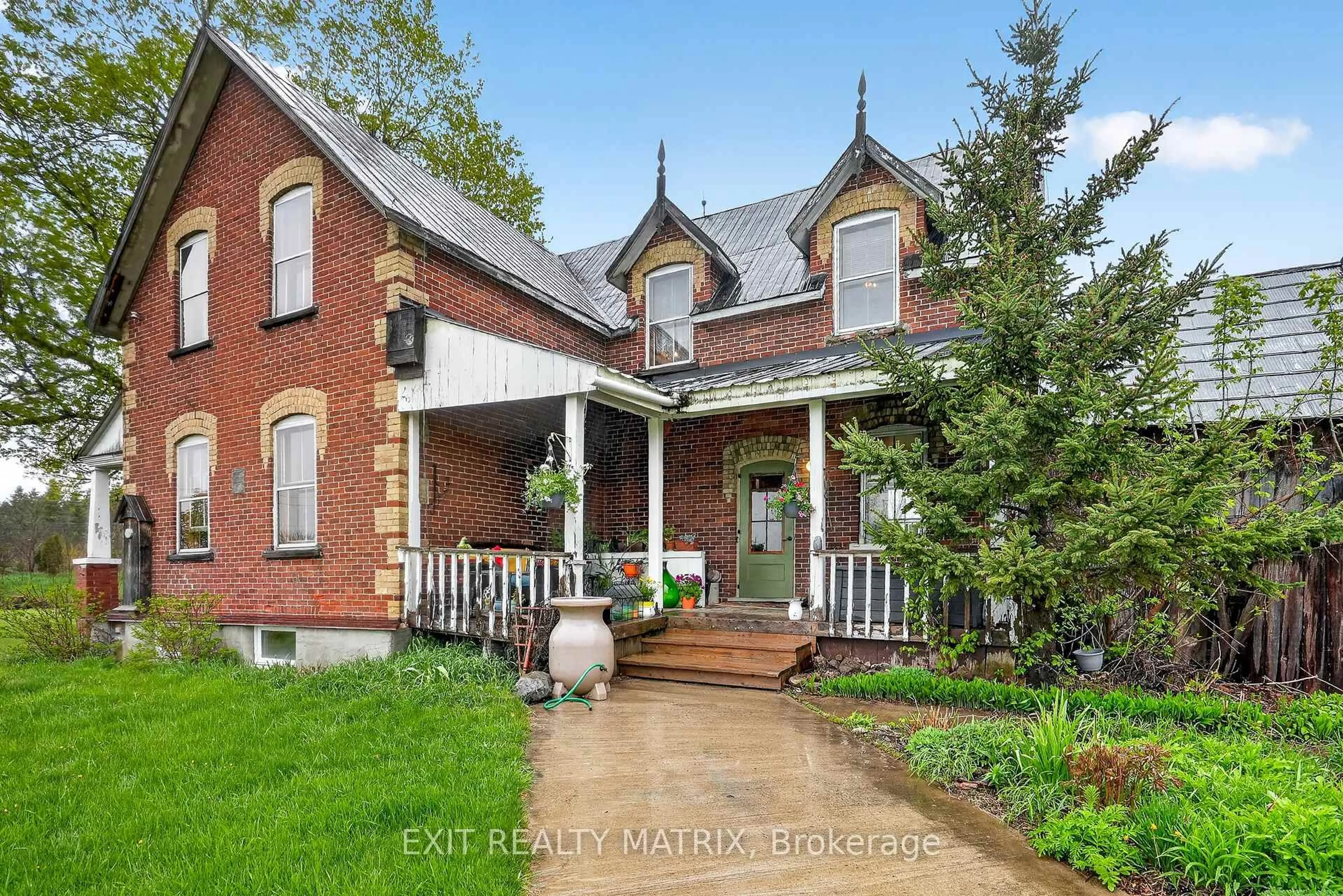 Home with brick exterior material, street for 7499 Bank St, Metcalfe Ontario K0A 2P0