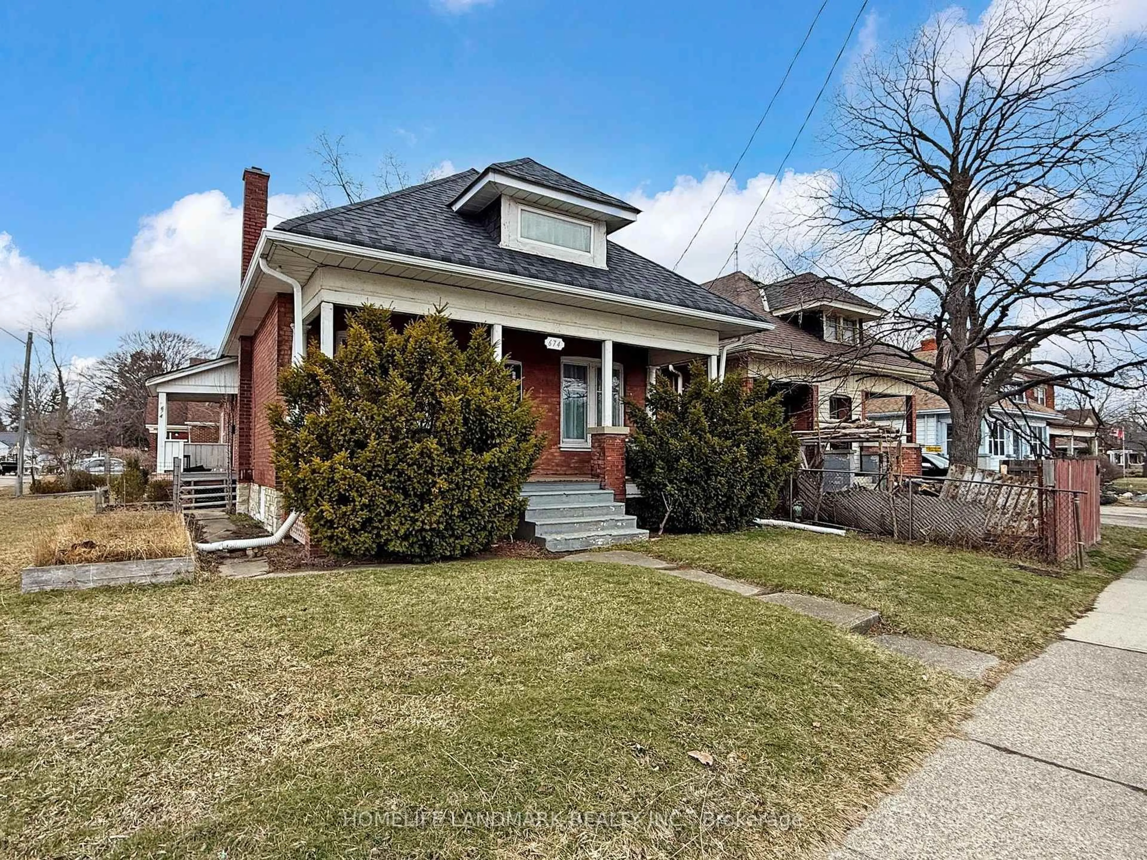 Home with brick exterior material, street for 674 Colborne St, Brantford Ontario N3S 3P9