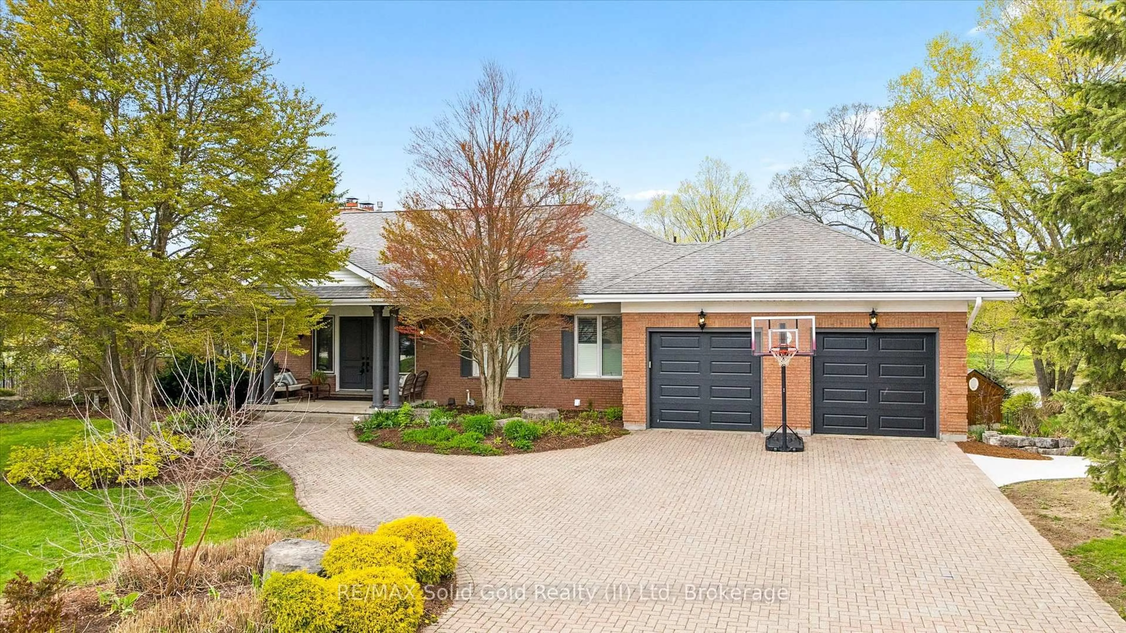 Home with brick exterior material, street for 306 Golf Course Rd, Woolwich Ontario N0B 1N0