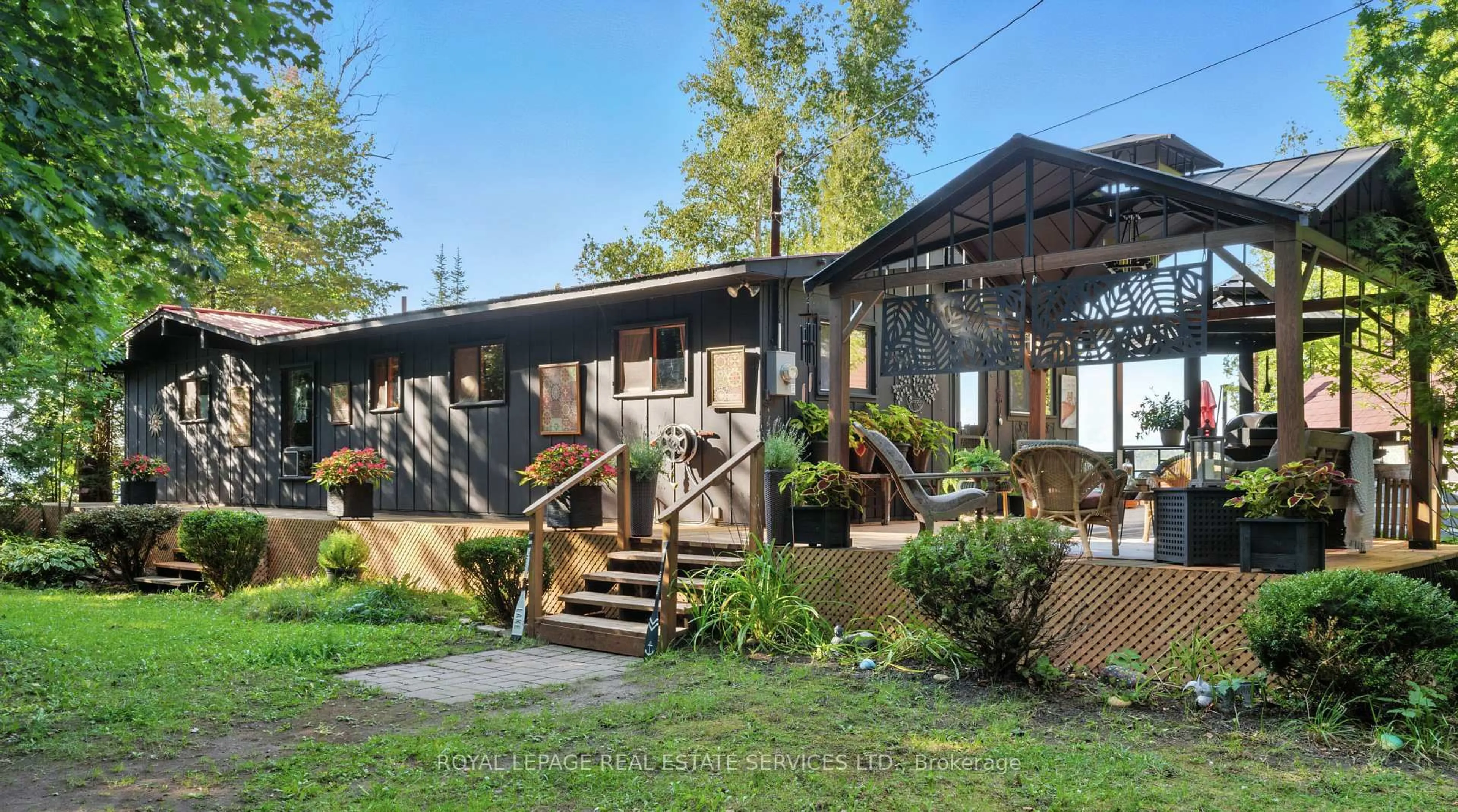 Home with vinyl exterior material, street for 2278 Shore Rd, St. Joseph Ontario P0R 1J0