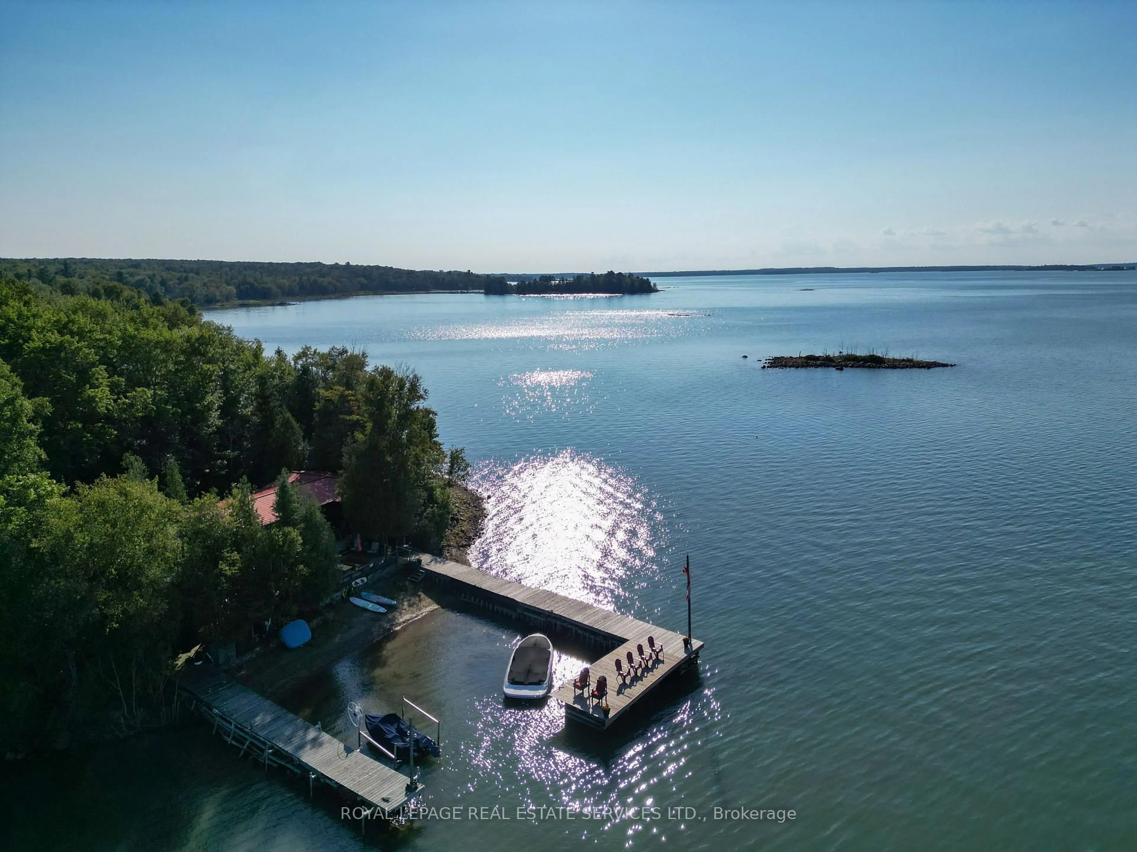 A pic from outside/outdoor area/front of a property/back of a property/a pic from drone, water/lake/river/ocean view for 2278 Shore Rd, St. Joseph Ontario P0R 1J0