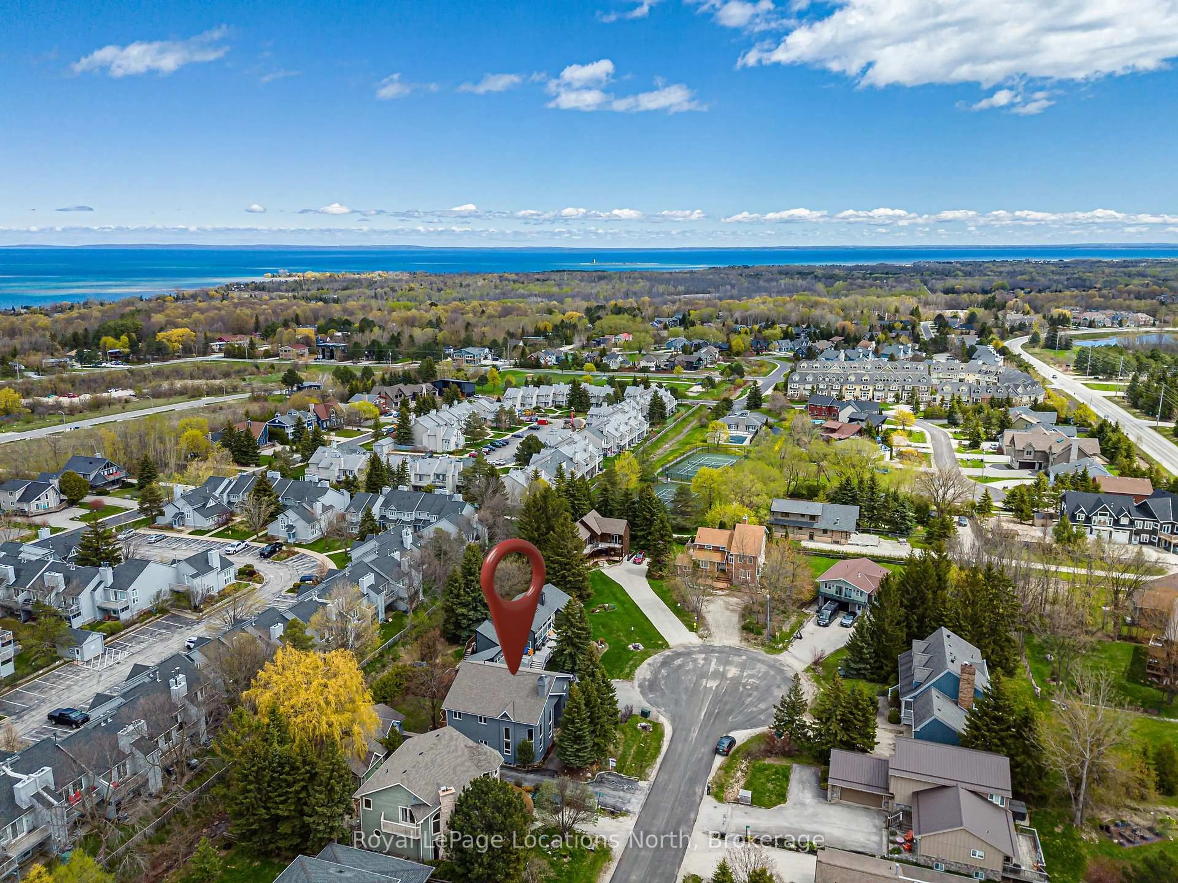 A pic from outside/outdoor area/front of a property/back of a property/a pic from drone, water/lake/river/ocean view for 137 Pioneer Lane, Blue Mountains Ontario L9Y 0M7