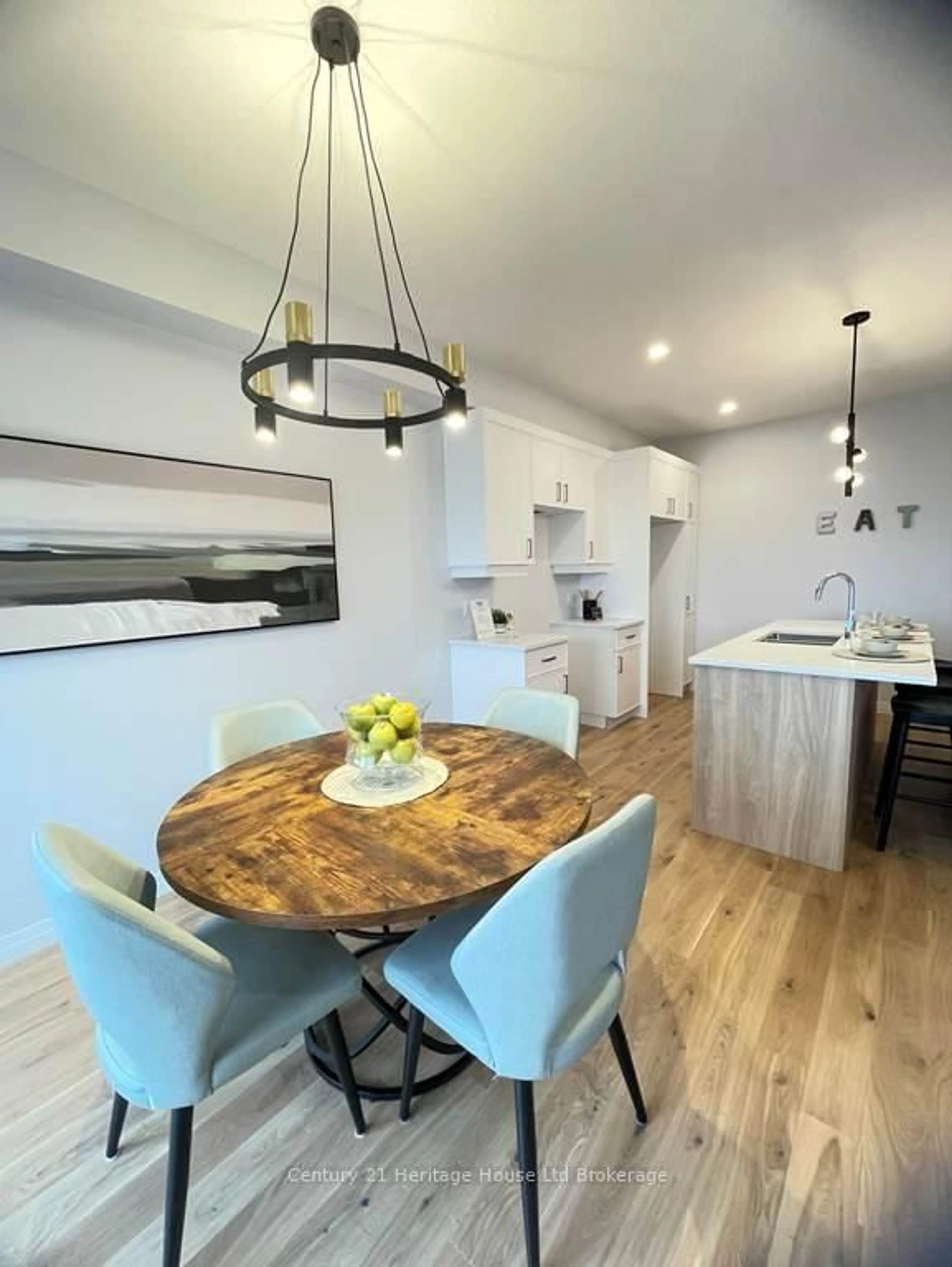 Open concept kitchen, wood/laminate floor for 321 Kading Cres, Woodstock Ontario N4S 0G6