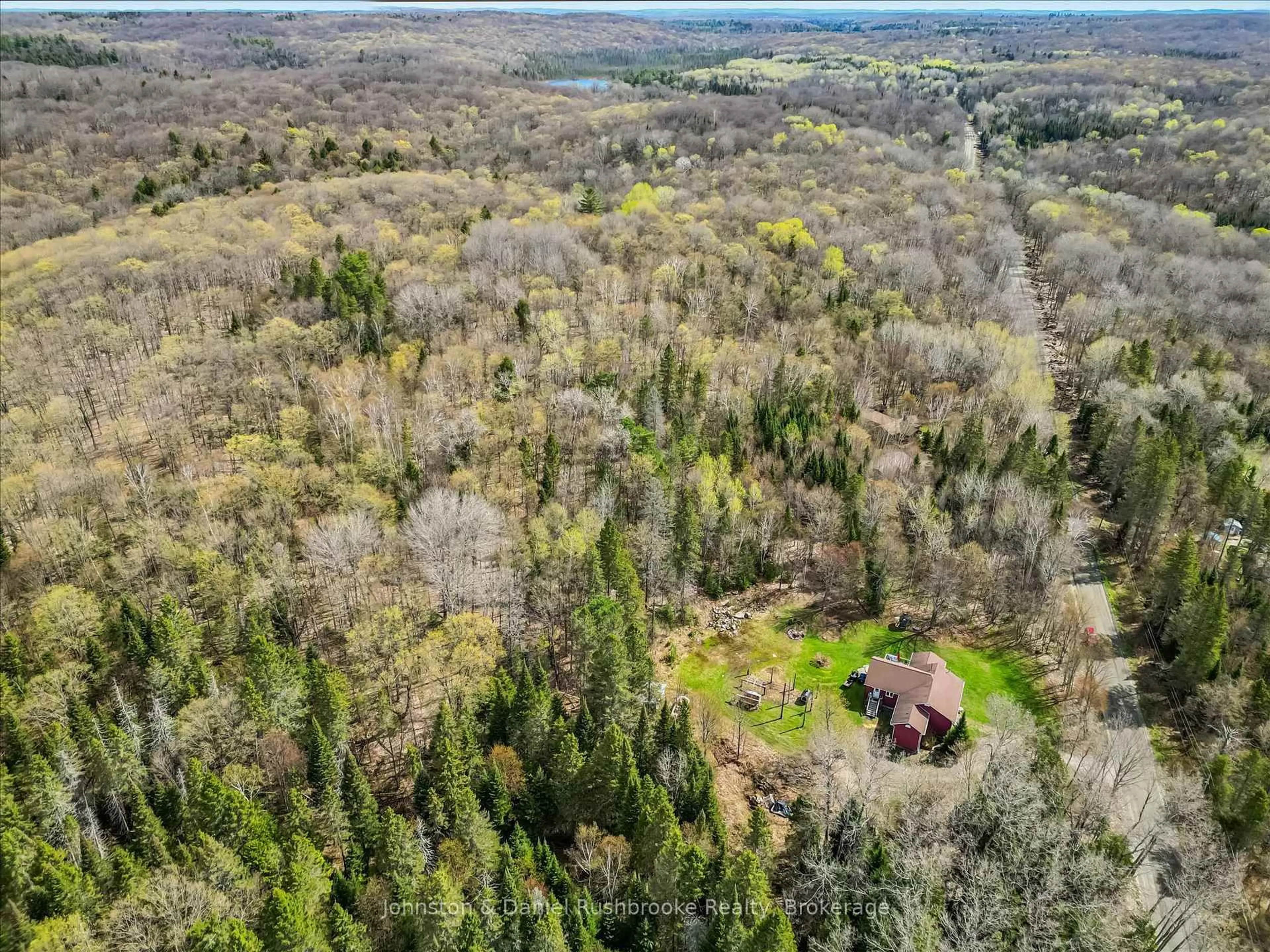 A pic from outside/outdoor area/front of a property/back of a property/a pic from drone, forest/trees view for 2519 South Horn Lake Rd R.R.#3 Rd, Magnetawan Ontario P0A 1C0