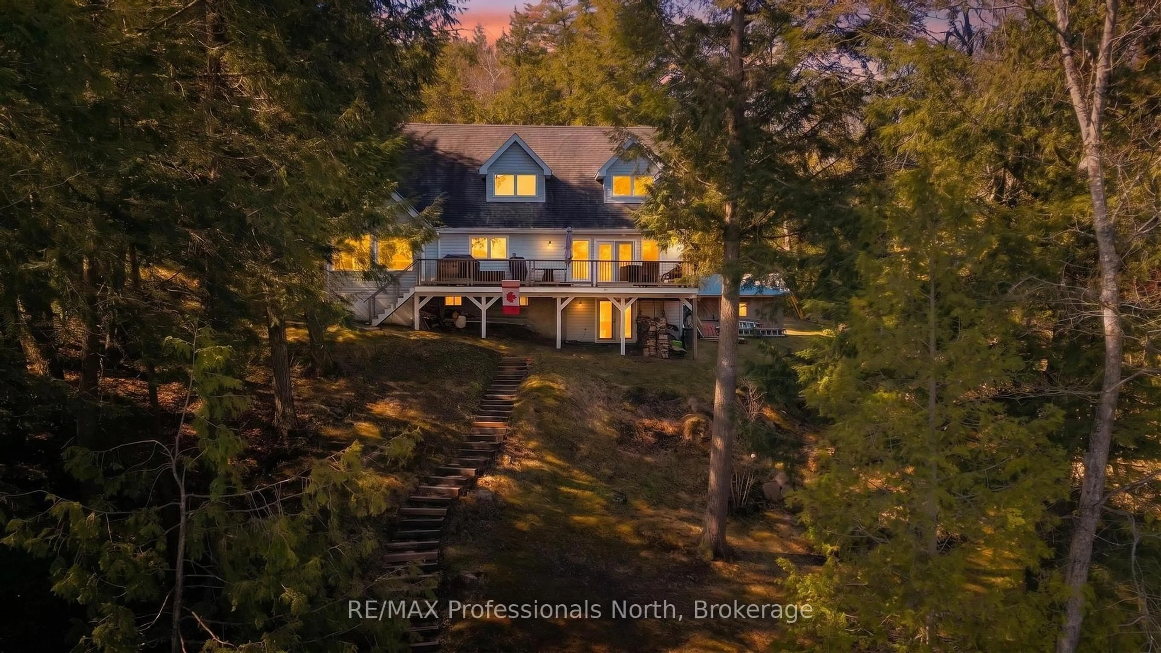 A pic from outside/outdoor area/front of a property/back of a property/a pic from drone, water/lake/river/ocean view for 1392 Tennyson Rd, Minden Hills Ontario K0M 2K0
