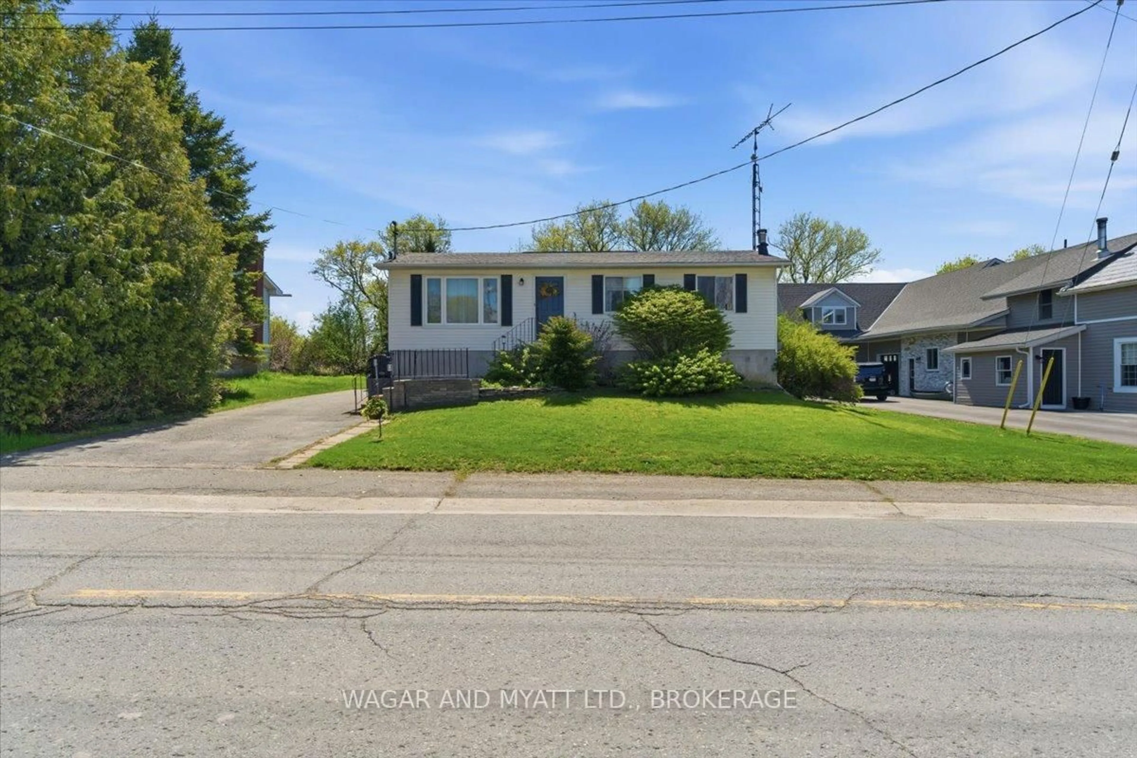 A pic from outside/outdoor area/front of a property/back of a property/a pic from drone, street for 429 County Rd 19 Concession, Prince Edward County Ontario K0K 1A0