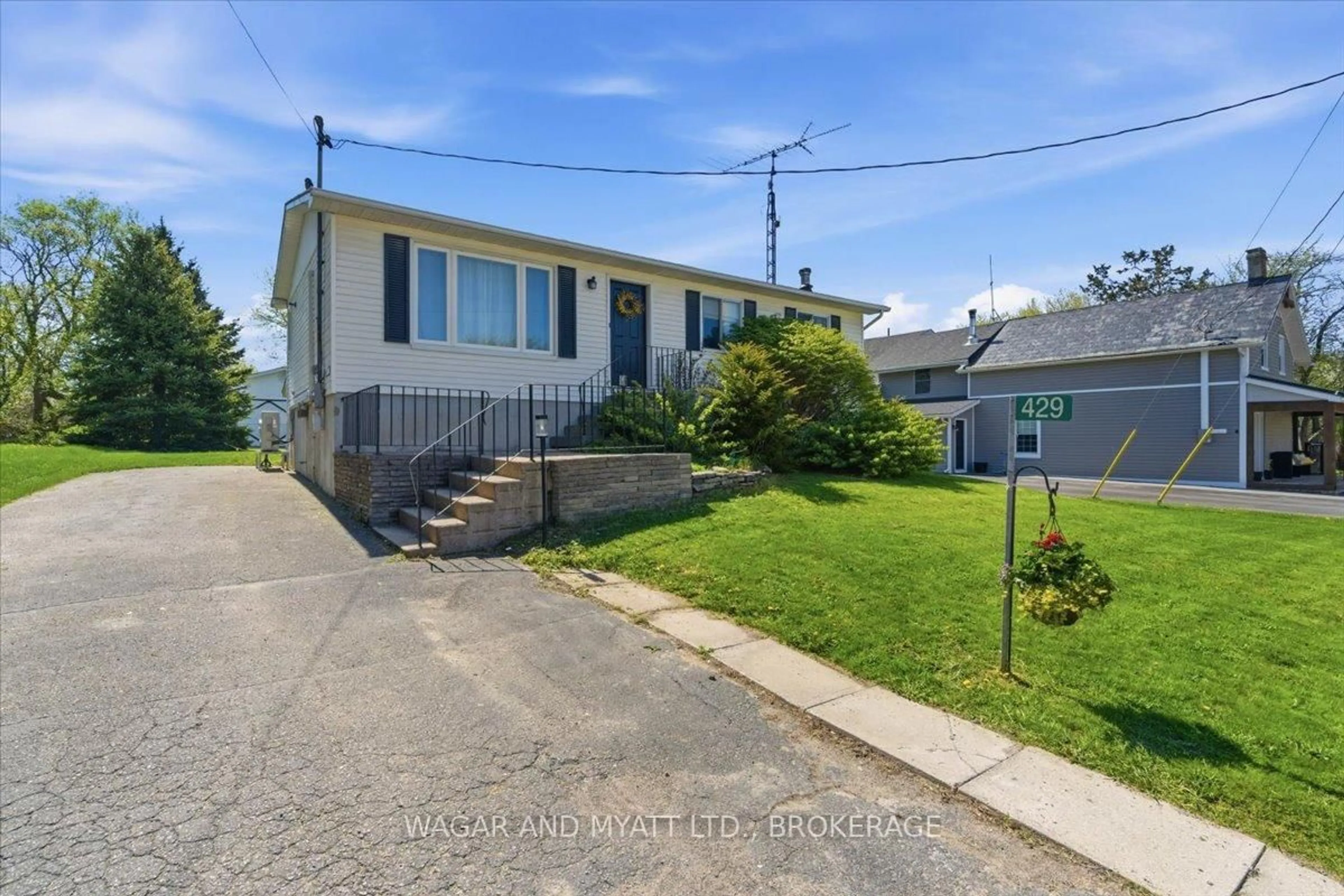 A pic from outside/outdoor area/front of a property/back of a property/a pic from drone, street for 429 County Rd 19 Concession, Prince Edward County Ontario K0K 1A0