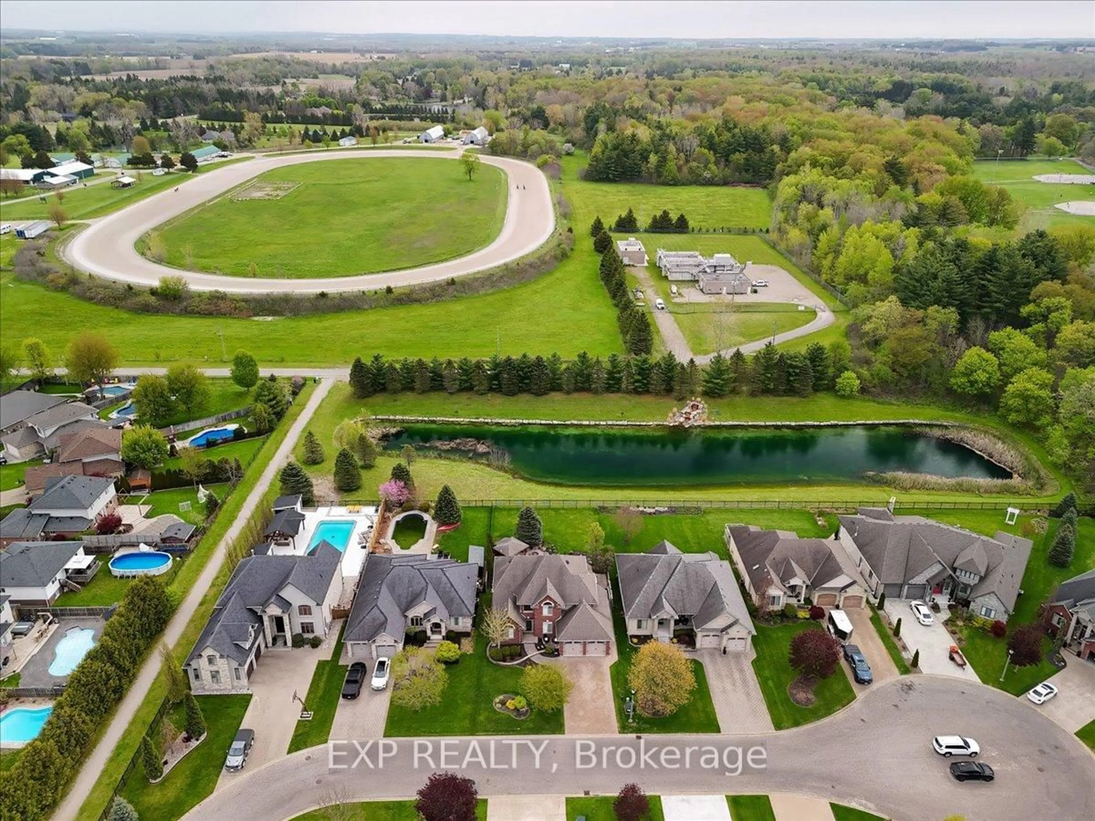 A pic from outside/outdoor area/front of a property/back of a property/a pic from drone, water/lake/river/ocean view for 80 Foxhollow Dr, Thames Centre Ontario N0L 1G3
