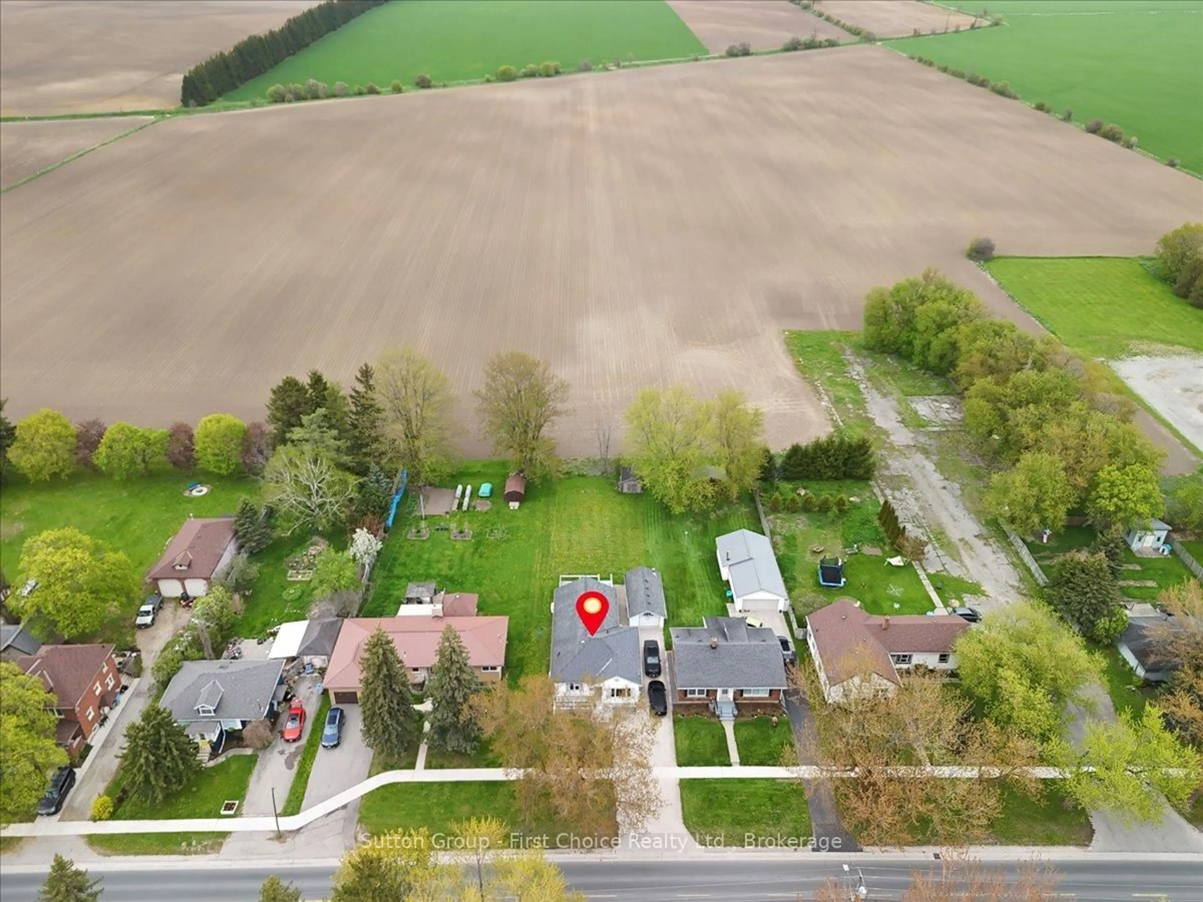 A pic from outside/outdoor area/front of a property/back of a property/a pic from drone, street for 202 Huron Rd, Perth South Ontario N0K 1X0