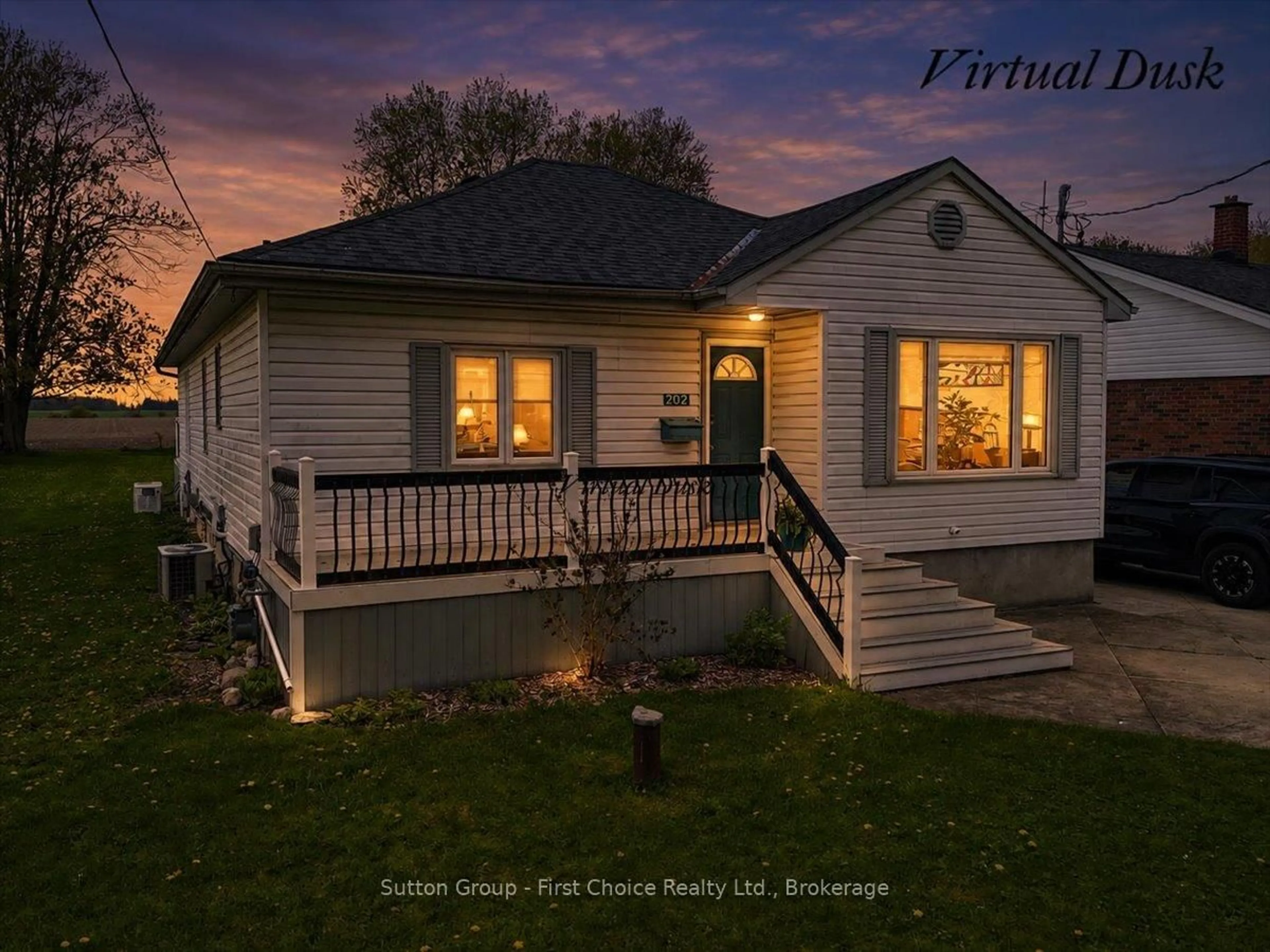 Home with vinyl exterior material, street for 202 Huron Rd, Perth South Ontario N0K 1X0