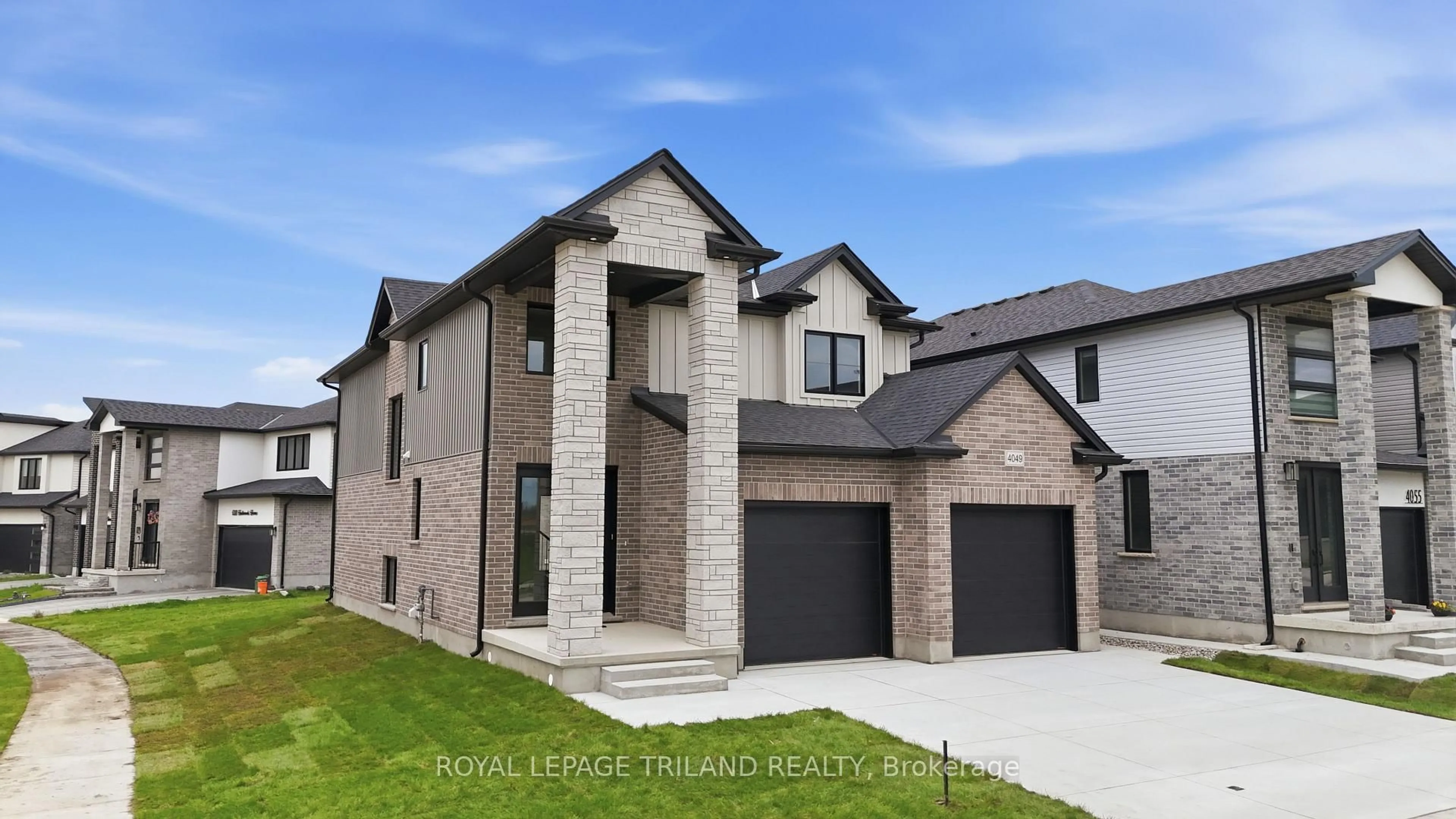Home with brick exterior material, street for 4049 Big Leaf Tr, London South Ontario N6P 0K2
