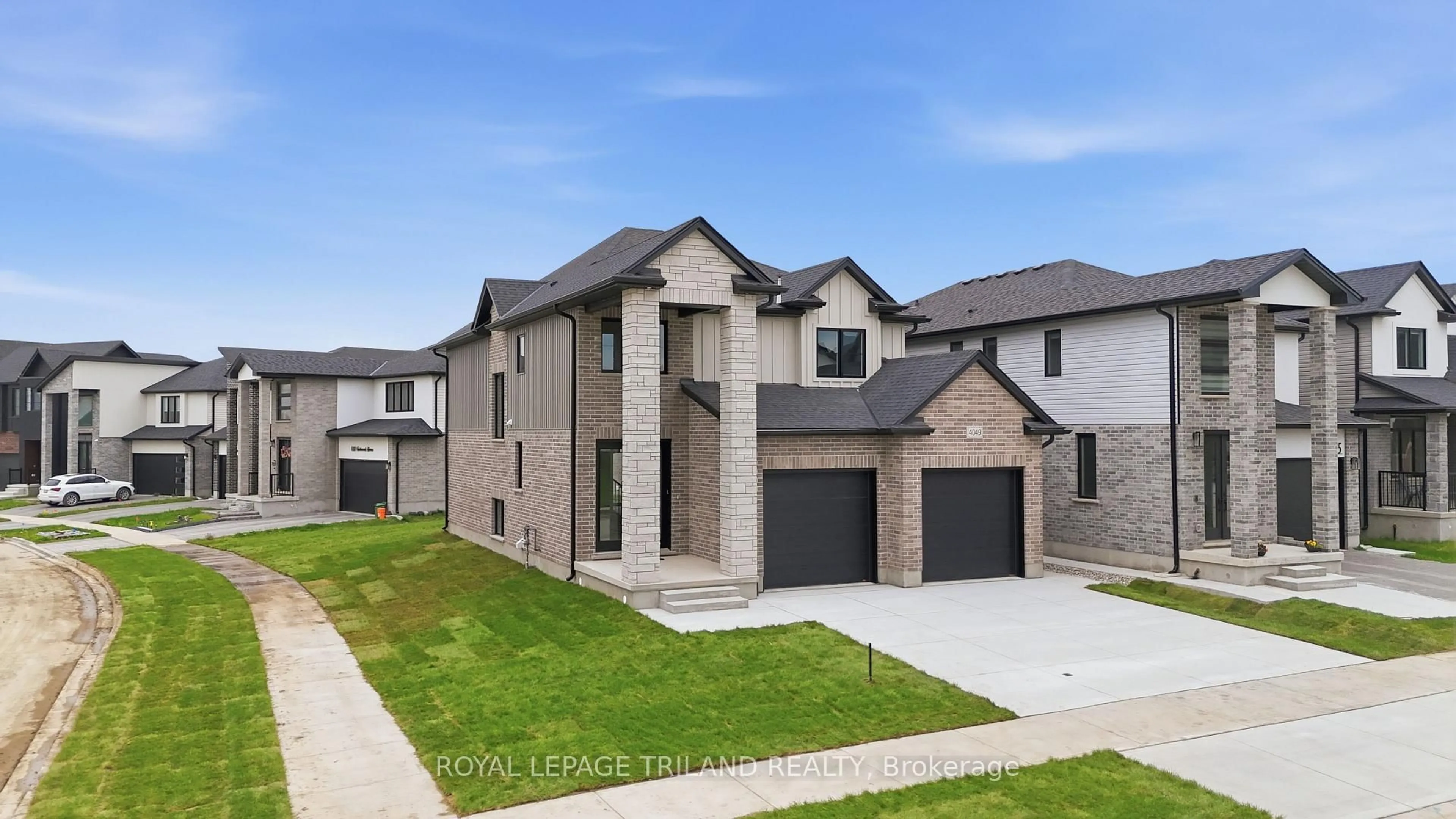 Home with brick exterior material, street for 4049 Big Leaf Tr, London South Ontario N6P 0K2