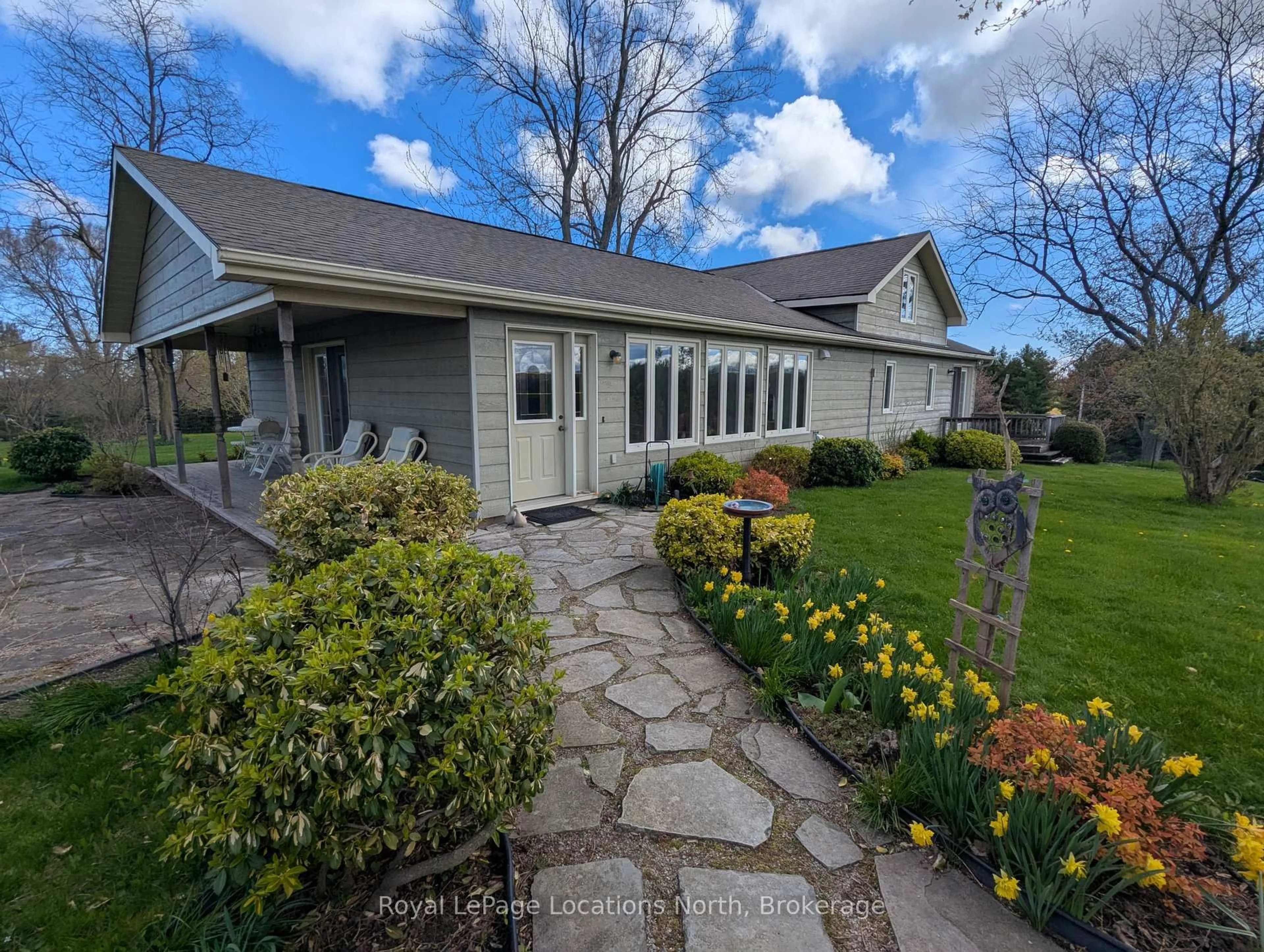 A pic from outside/outdoor area/front of a property/back of a property/a pic from drone, street for 125552 13 Sdrd, Meaford Ontario N4L 1W6