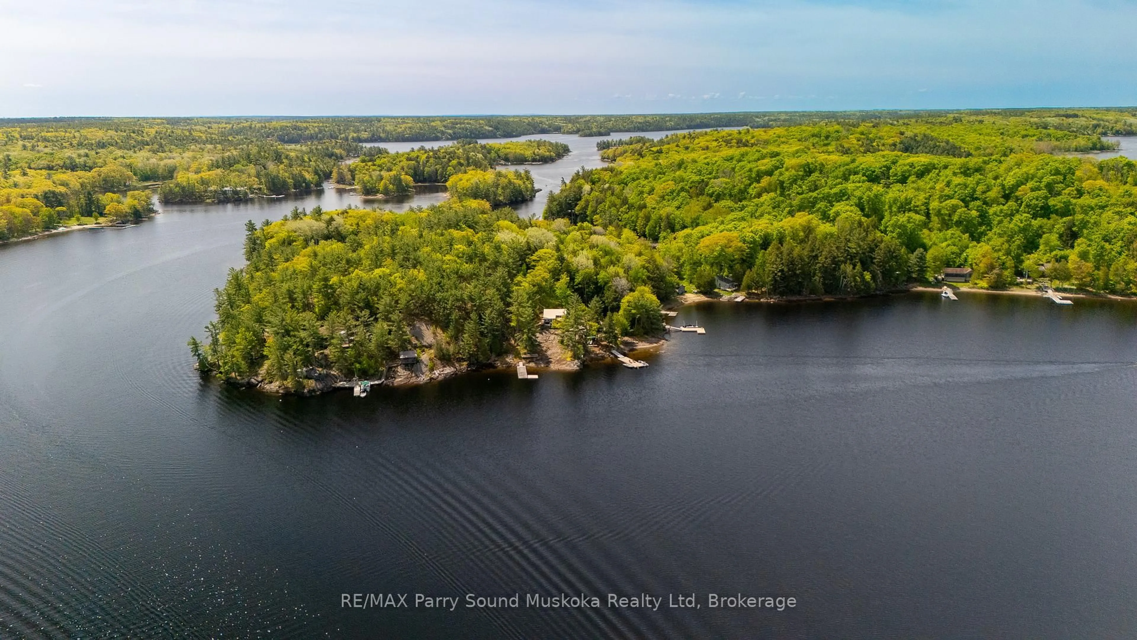 A pic from outside/outdoor area/front of a property/back of a property/a pic from drone, water/lake/river/ocean view for 7 Isabella Island, The Archipelago Ontario P2A 2W8