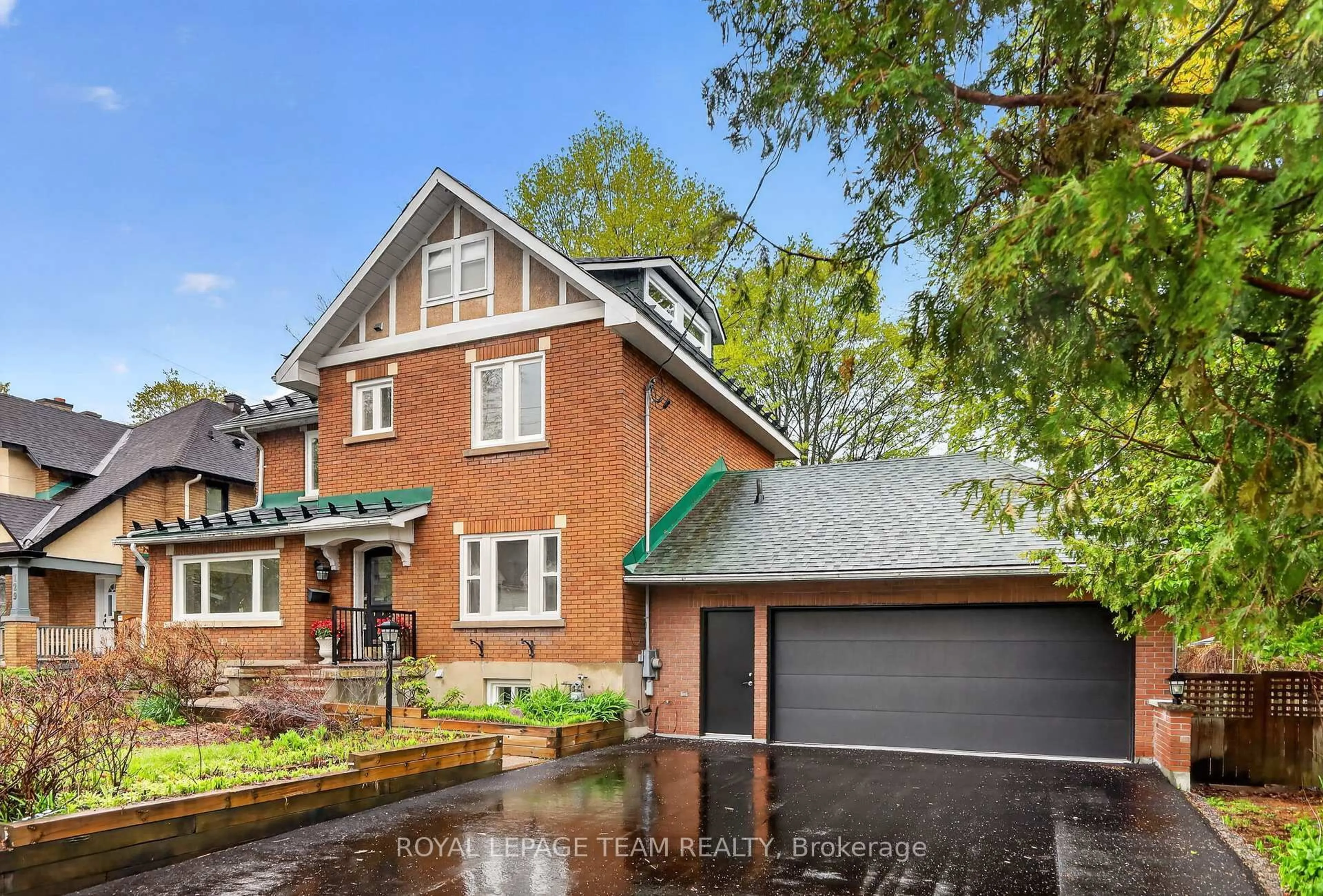 Home with brick exterior material, street for 131 Acacia Ave, Ottawa Ontario K1M 0R2