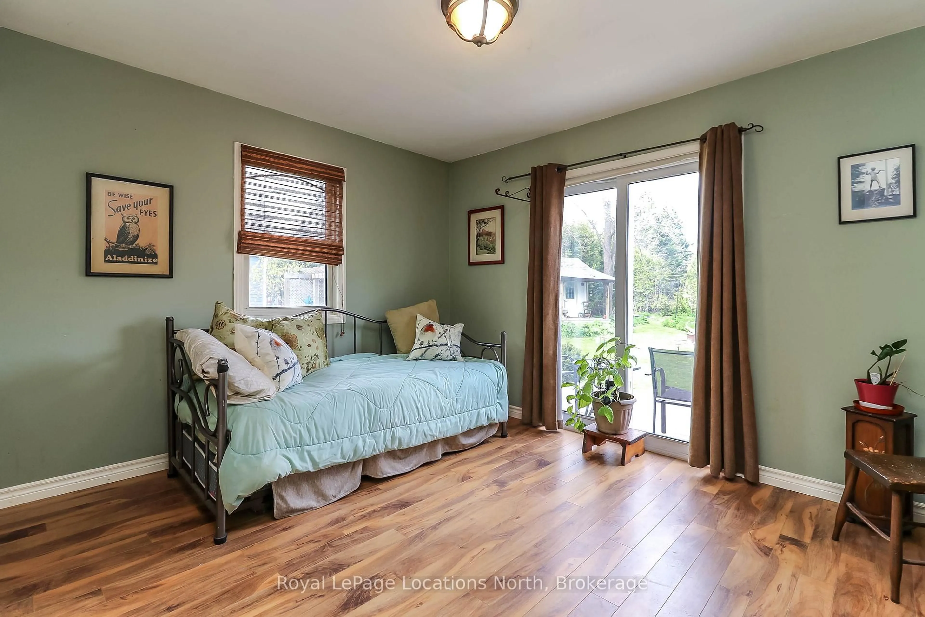 Bedroom with bed, wood/laminate floor for 118 Marsh St, Blue Mountains Ontario N0H 1J0