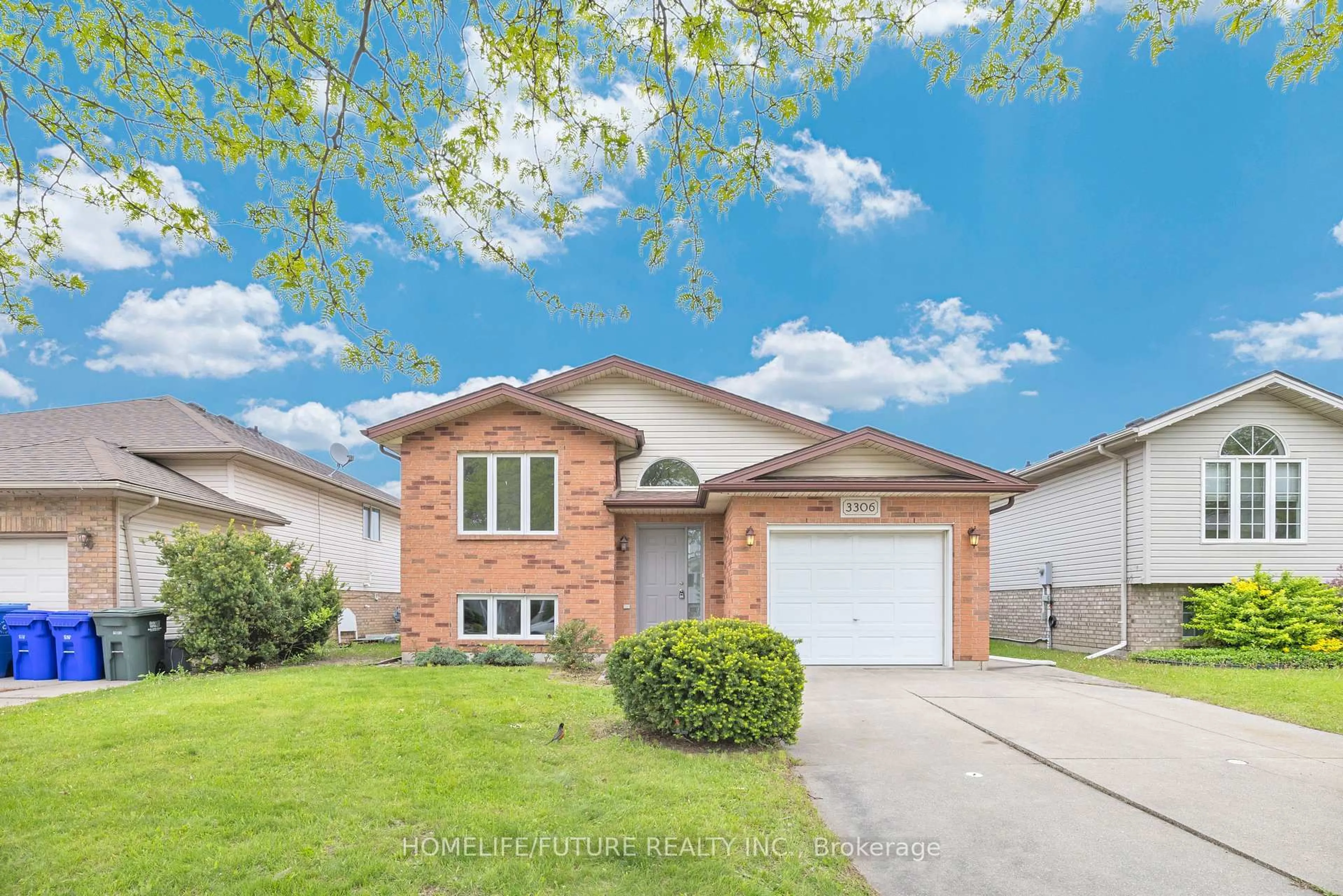 Home with brick exterior material, street for 3306 Conservation Dr, Windsor Ontario N8W 5P2