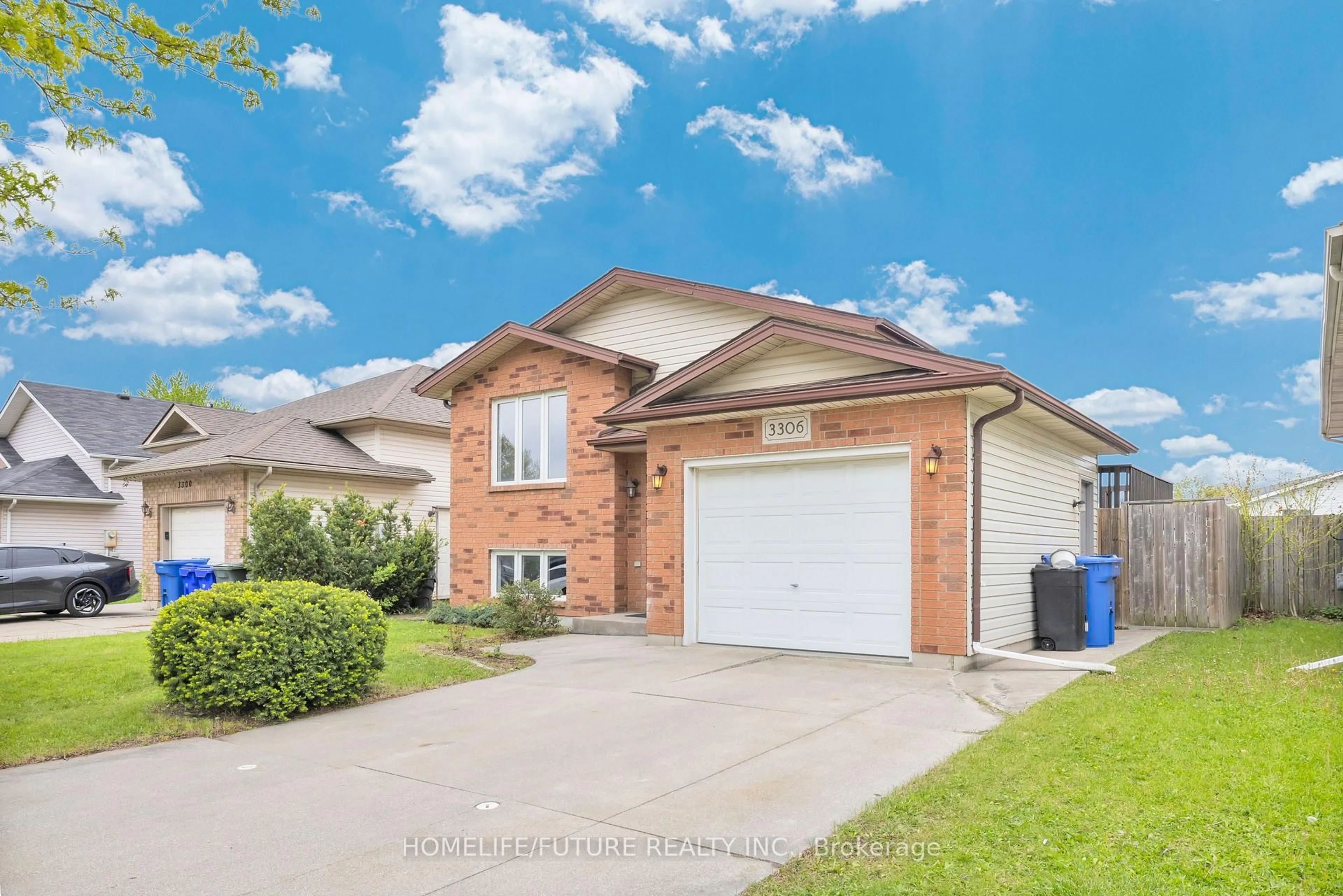 Home with brick exterior material, street for 3306 Conservation Dr, Windsor Ontario N8W 5P2