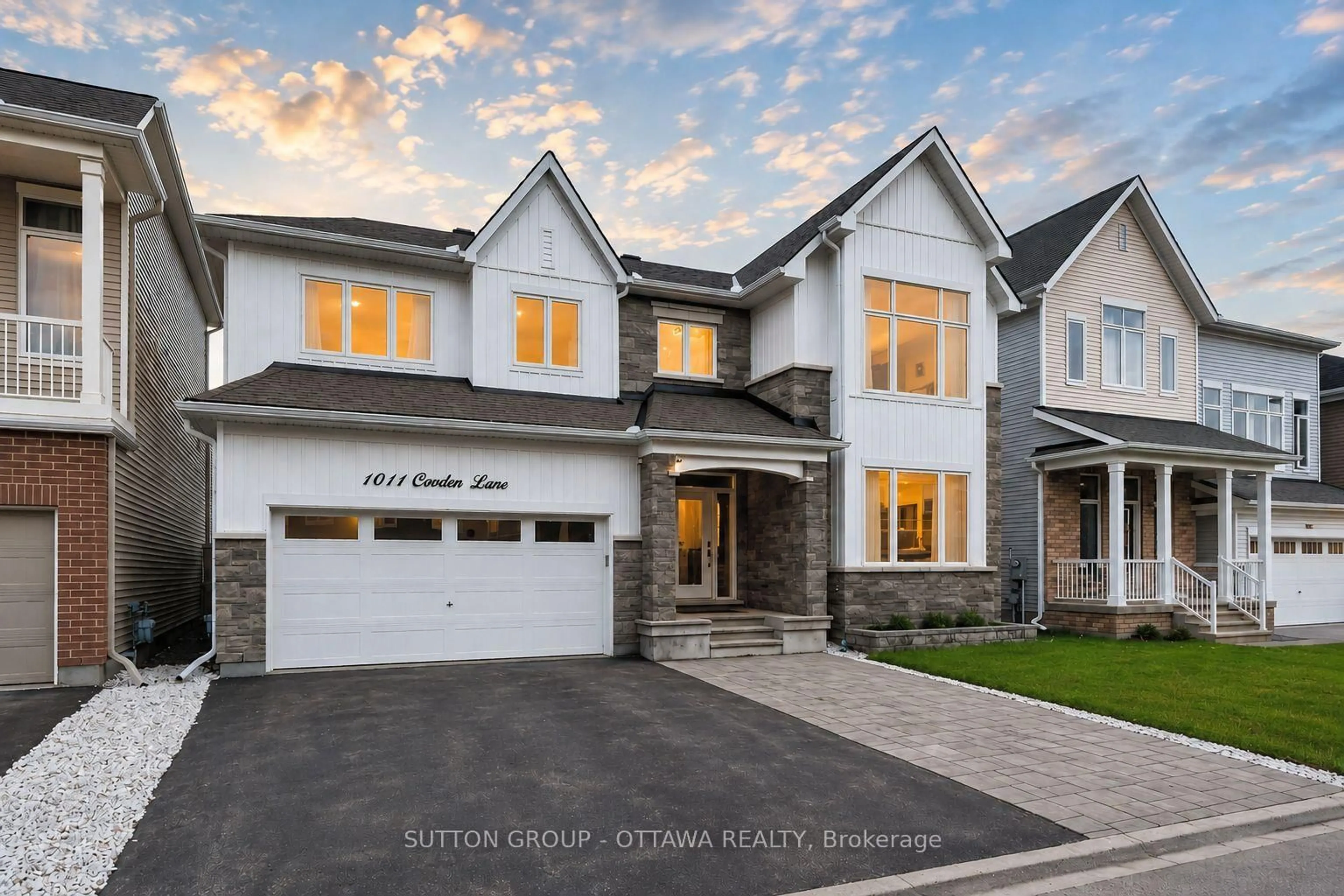 Home with brick exterior material, street for 1011 Carden Lane, Ottawa Ontario K1W 0N3