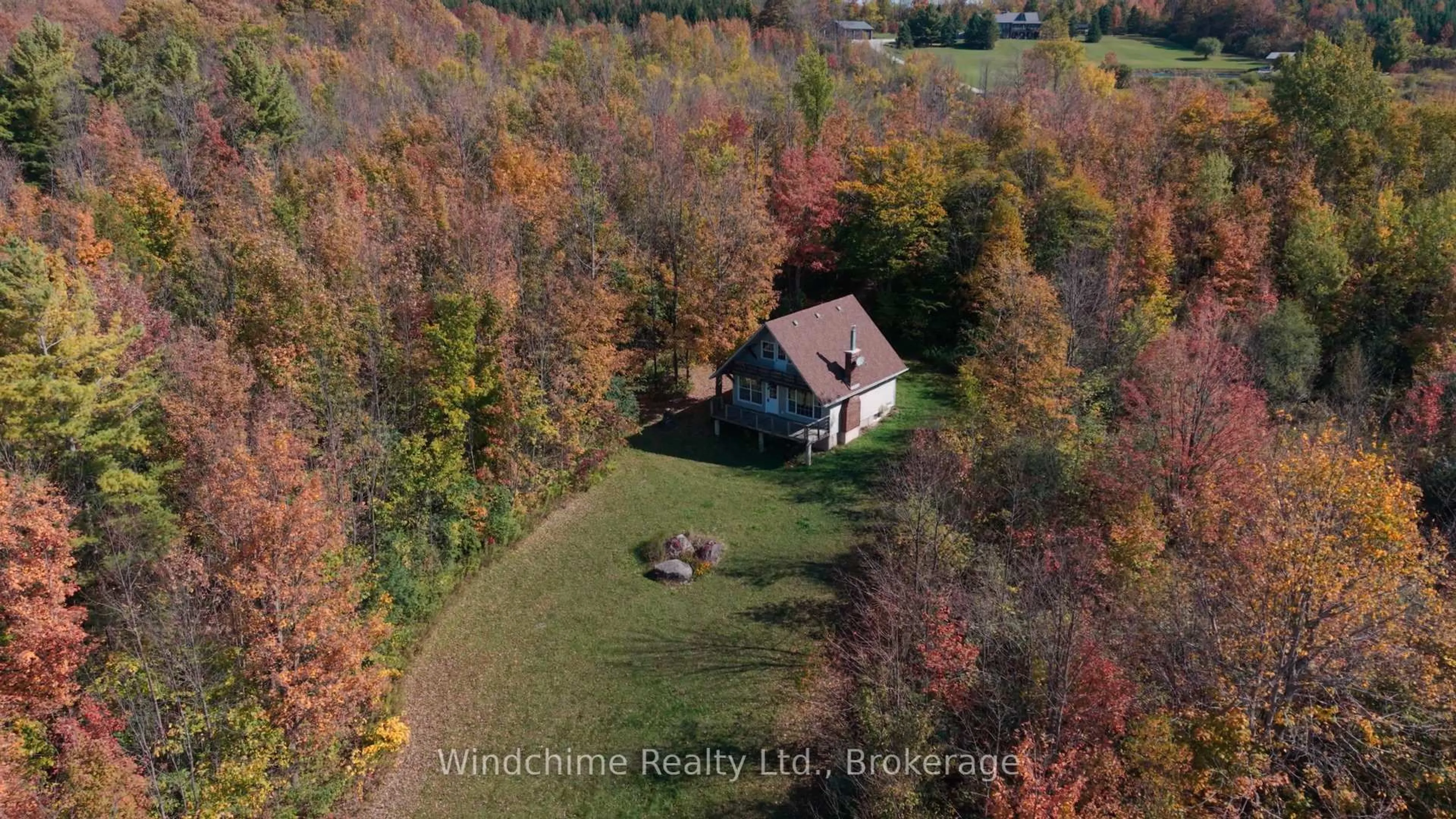 A pic from outside/outdoor area/front of a property/back of a property/a pic from drone, unknown for 110 Old Baldy Access Rd, Grey Highlands Ontario N0C 1G0