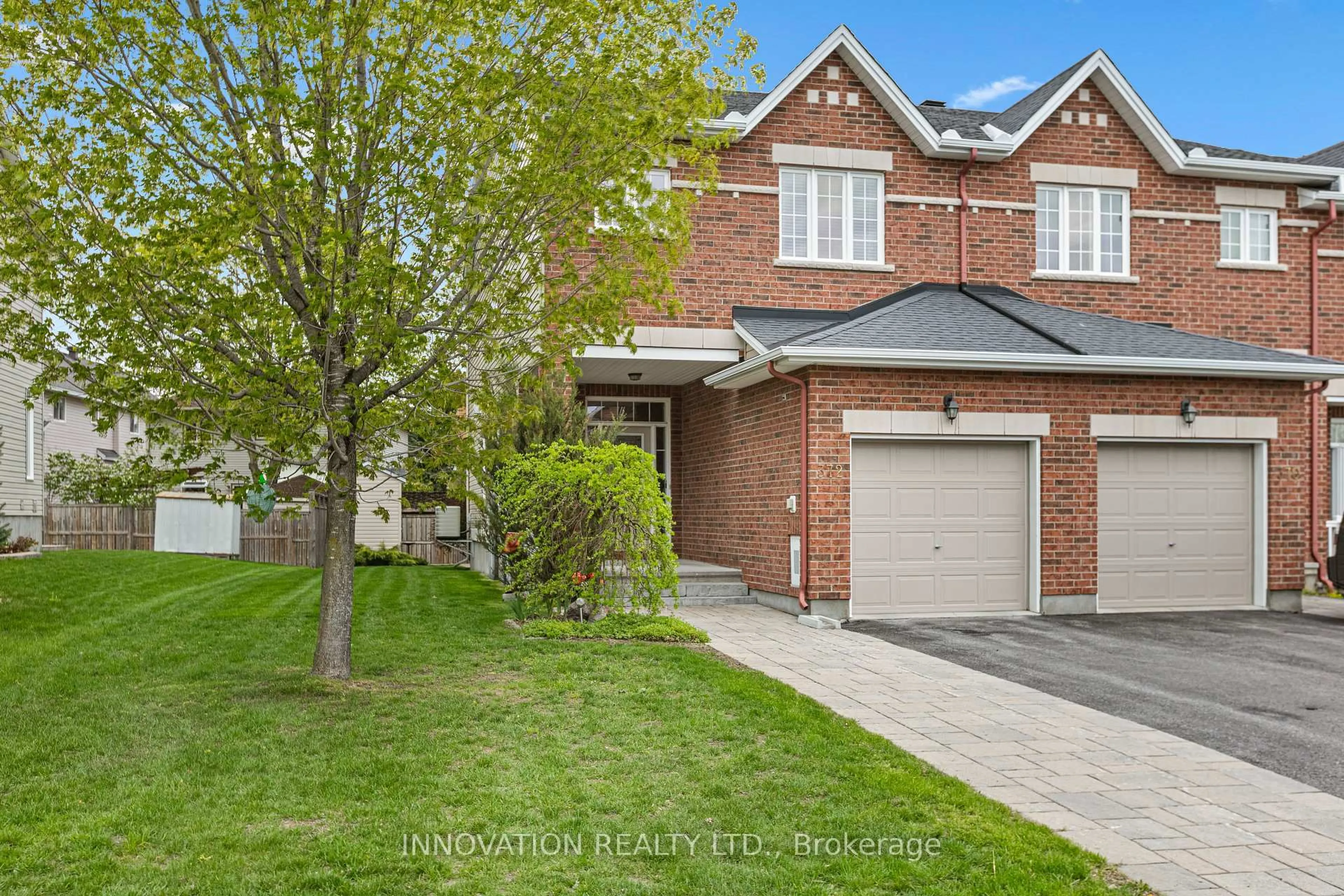 Home with brick exterior material, street for 372 Kingbrook Dr, Ottawa Ontario K2M 0G2