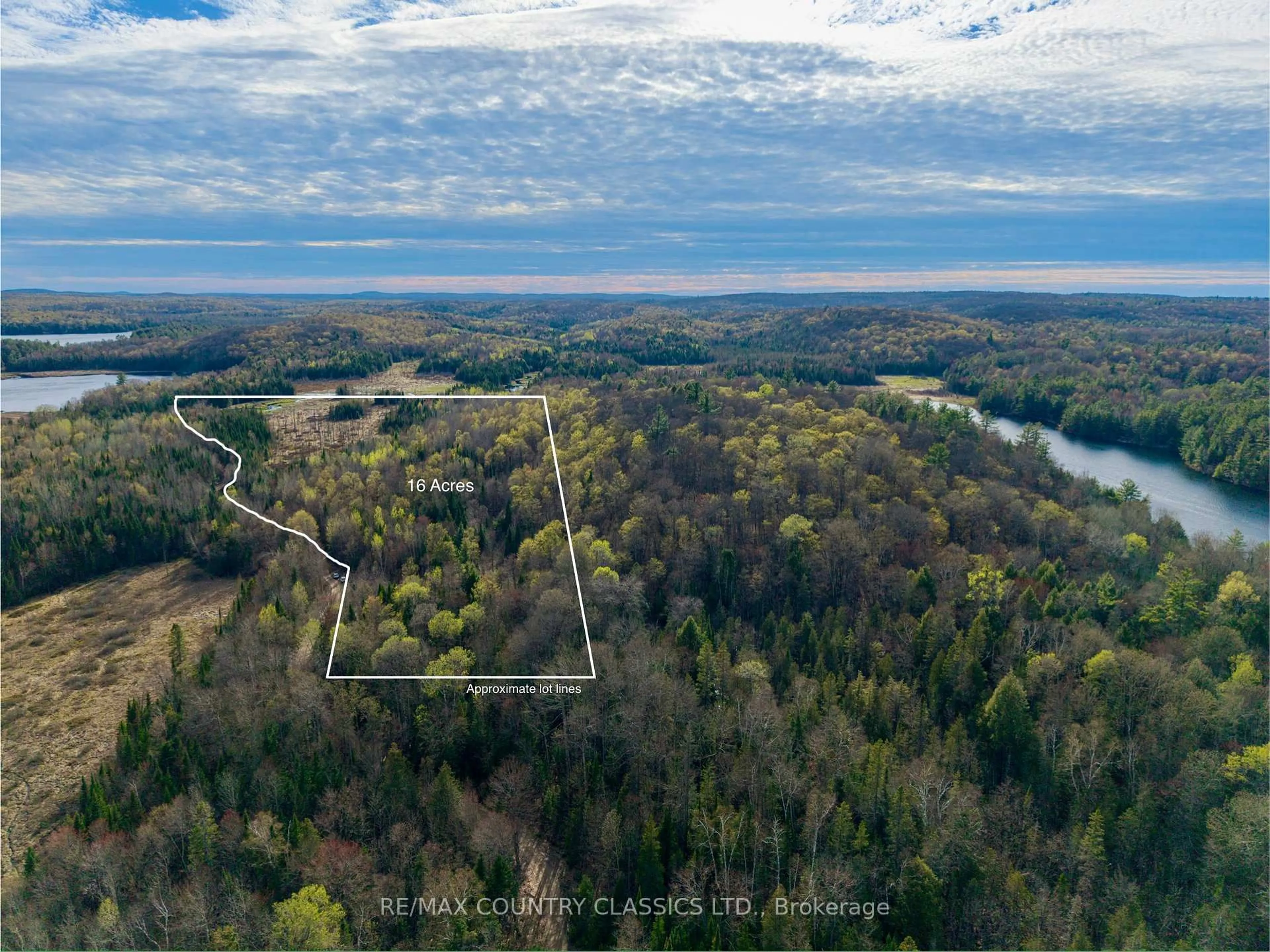 A pic from outside/outdoor area/front of a property/back of a property/a pic from drone, water/lake/river/ocean view for 1374 Havensford Dr, Highlands East Ontario K0L 1M0