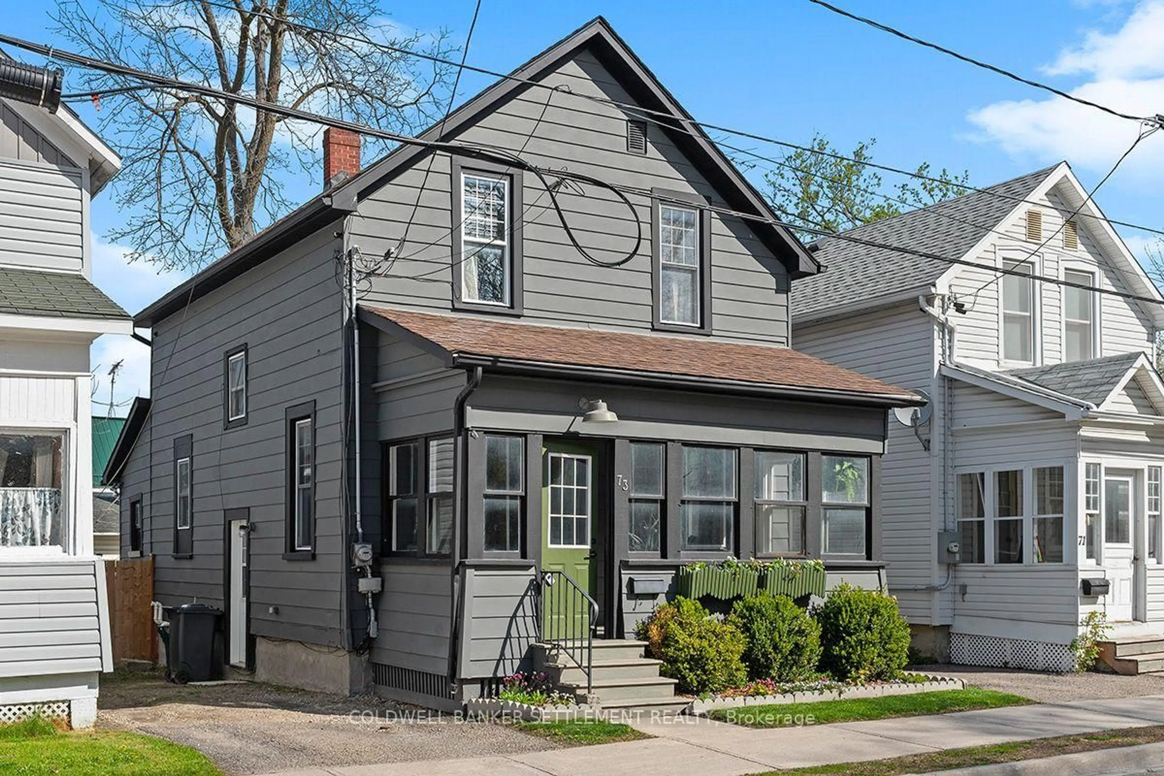 Home with vinyl exterior material, street for 73 Craig St, Perth Ontario K7H 1Y6
