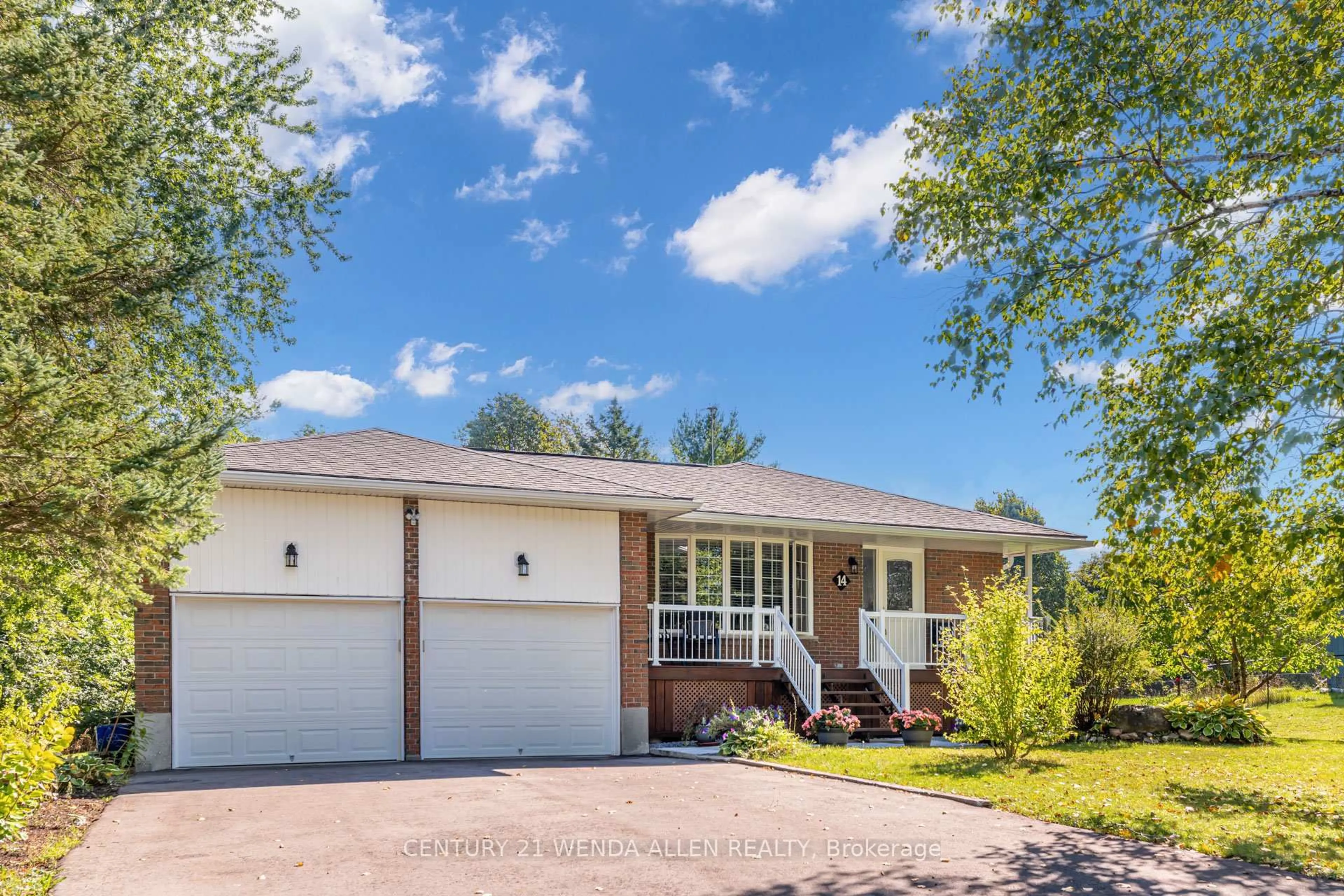 Home with brick exterior material, street for 14 Manvers Dr, Kawartha Lakes Ontario L0B 1K0