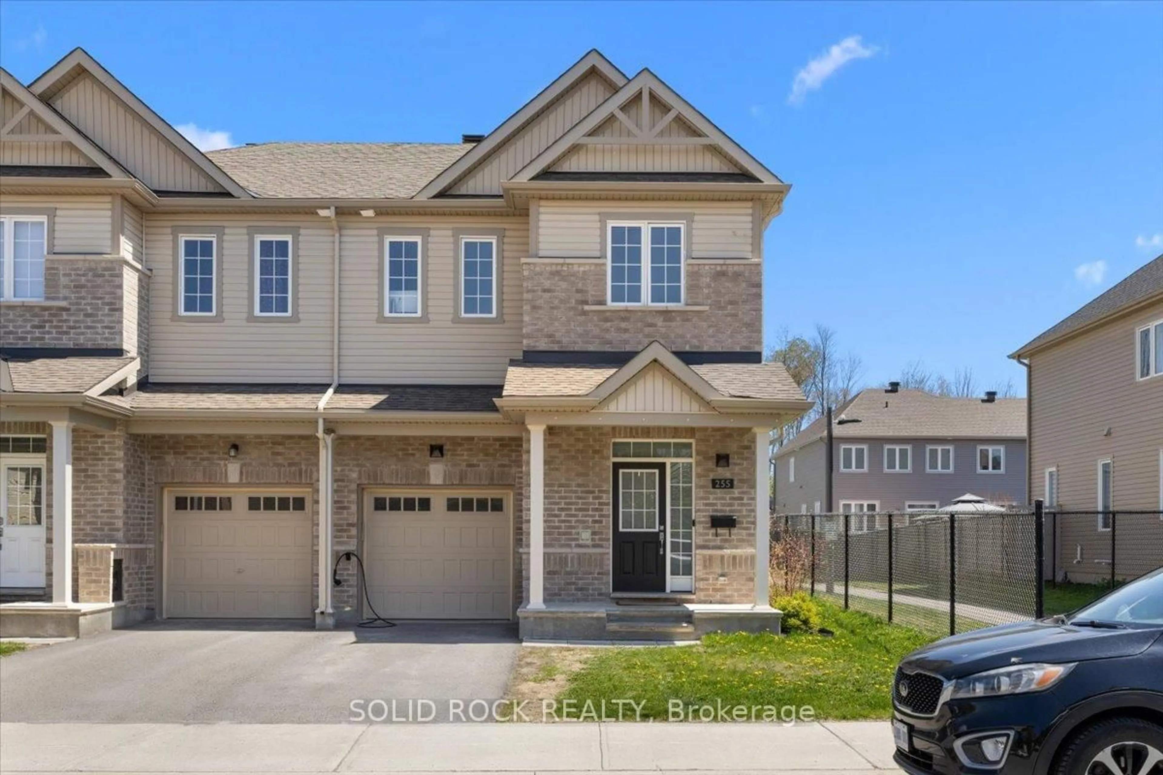 Home with brick exterior material, street for 255 Trailsedge Way, Ottawa Ontario K1W 0E8