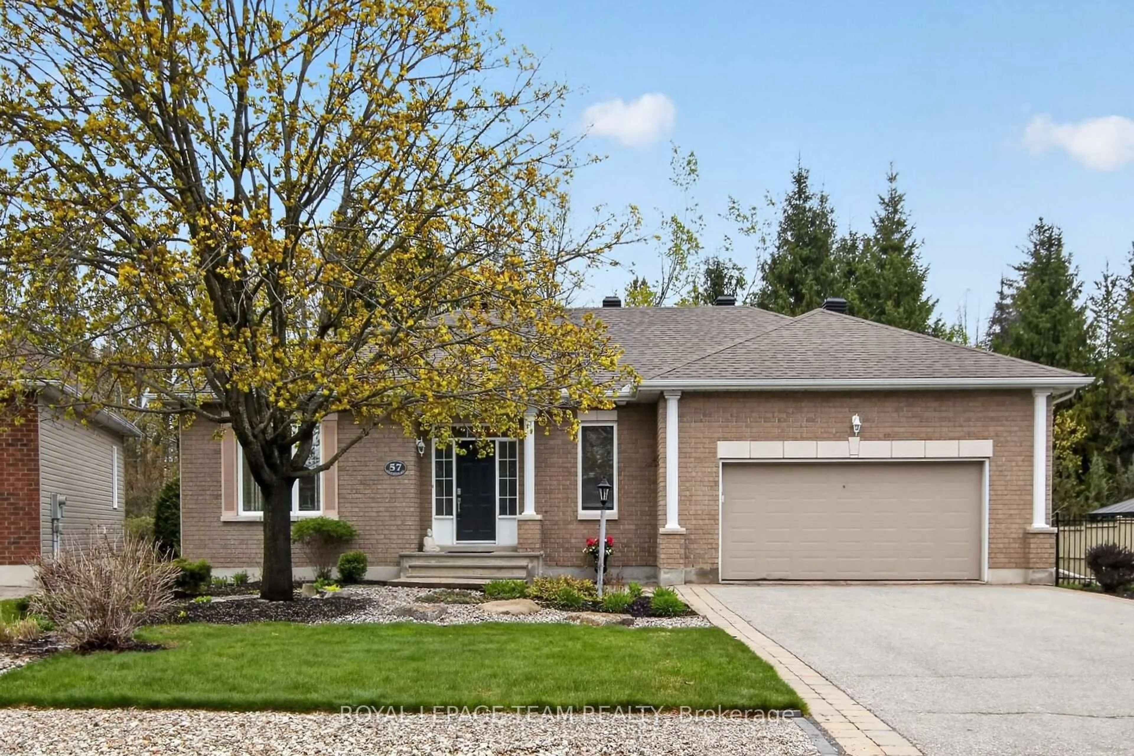 Home with brick exterior material, street for 57 Wilderness Way, Ottawa Ontario K2S 2E3