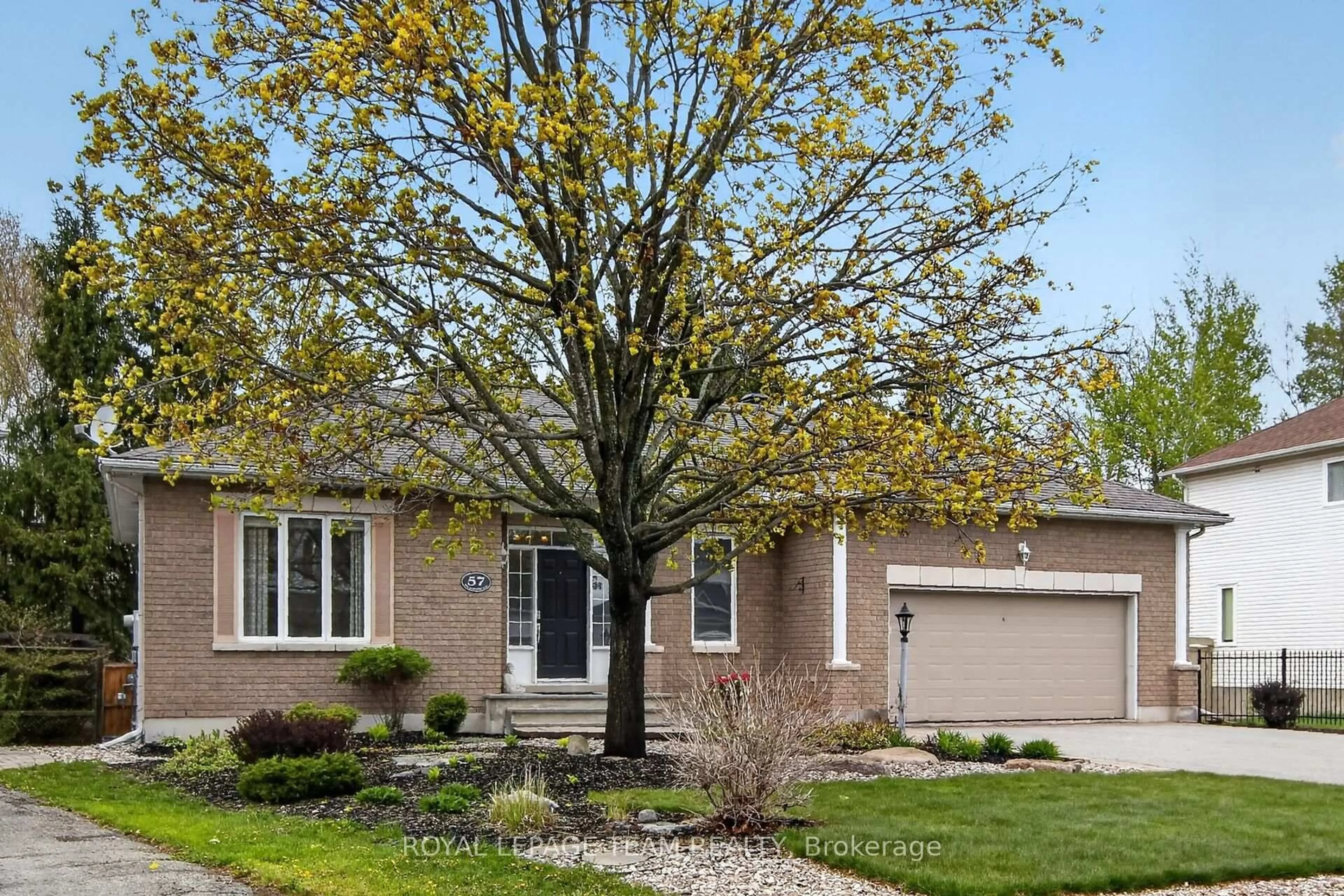 Home with brick exterior material, street for 57 Wilderness Way, Ottawa Ontario K2S 2E3