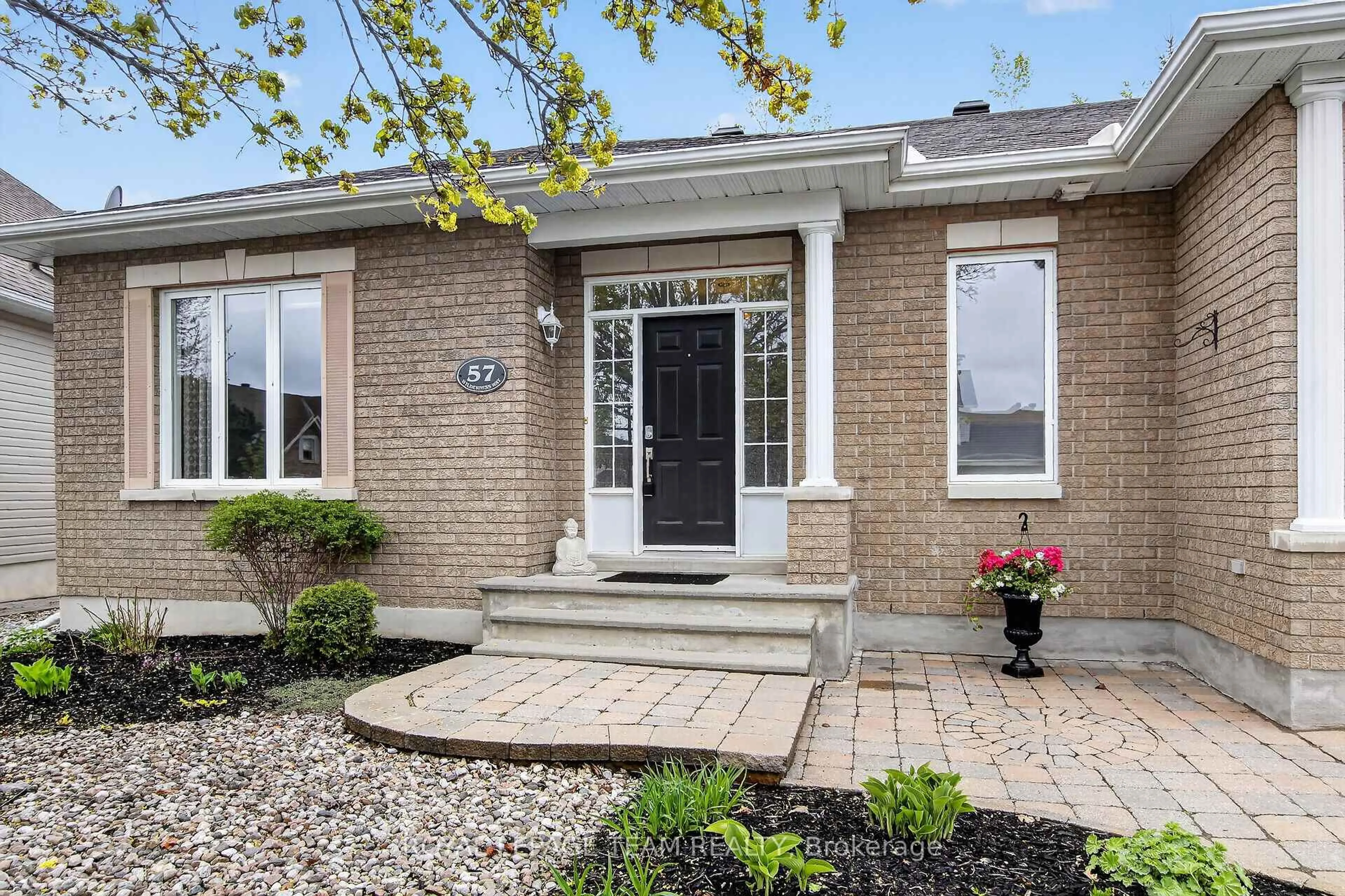 Home with brick exterior material, street for 57 Wilderness Way, Ottawa Ontario K2S 2E3